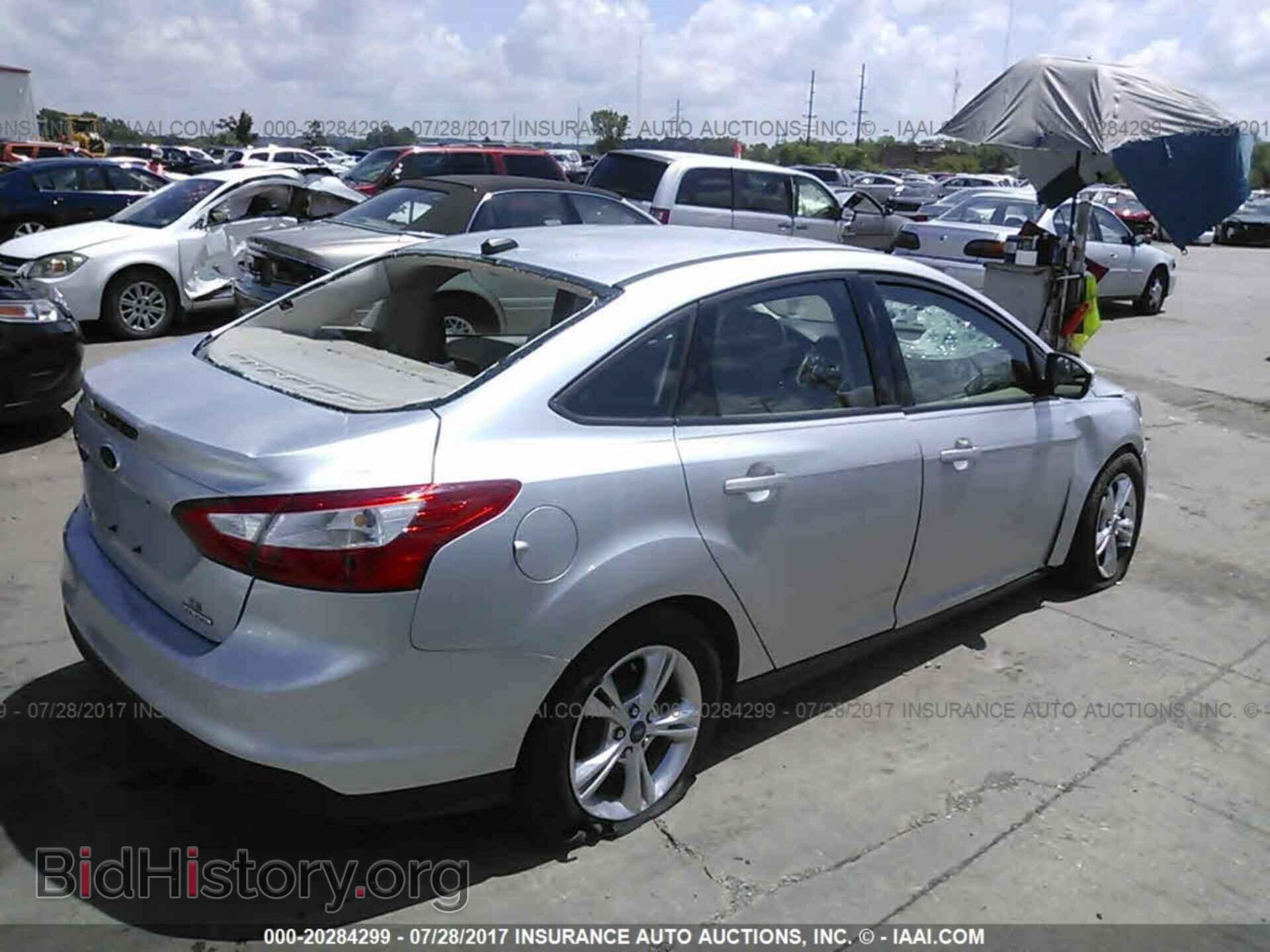 2014 Ford Focus - VIN: 1FADP3F23EL123276 - Фото 4