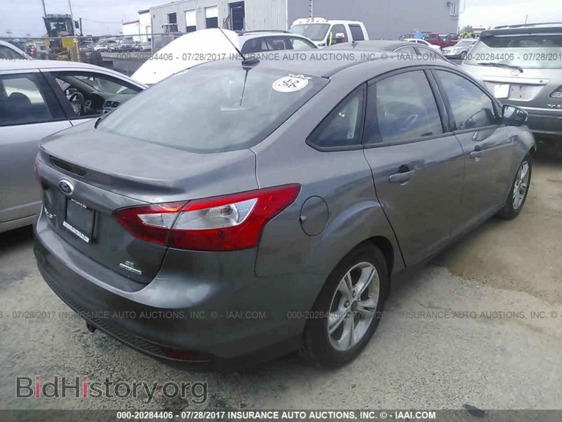 2014 Ford Focus - VIN: 1FADP3F20EL278044 - Фото 4