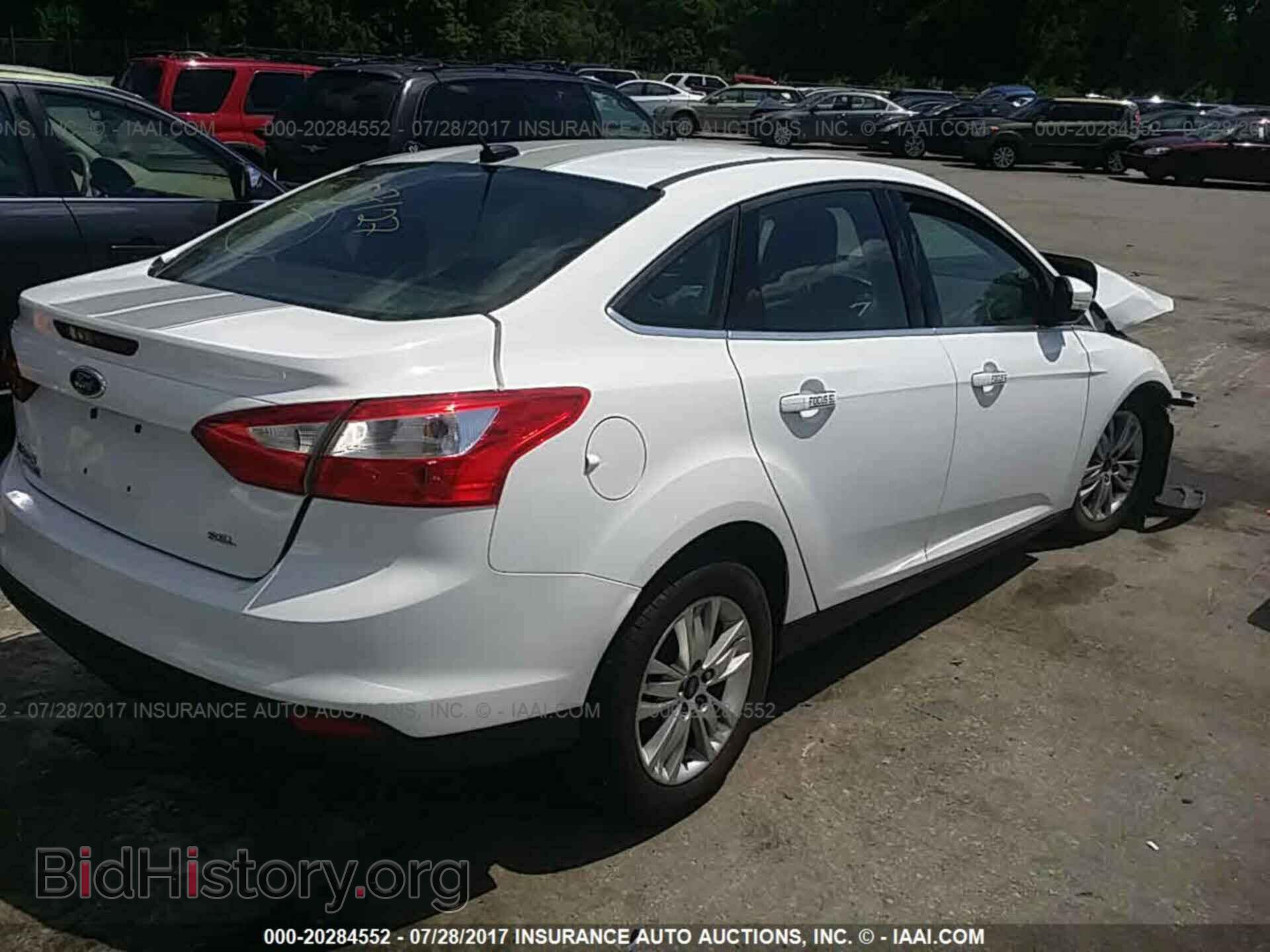2012 Ford Focus - VIN: 1FAHP3H29CL161767 - Photo 4