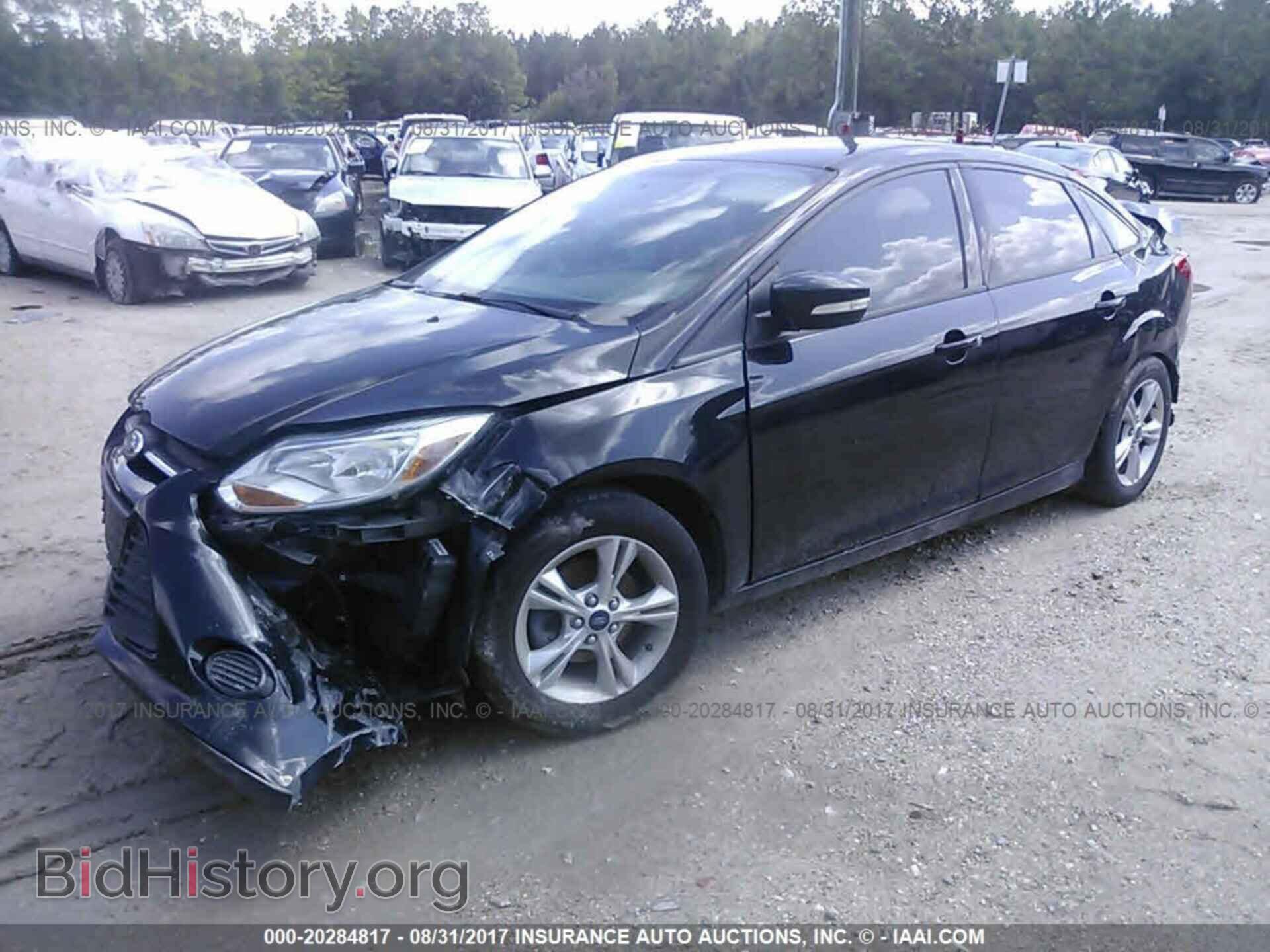 2014 Ford Focus - VIN: 1FADP3F28EL309539 - Photo 2
