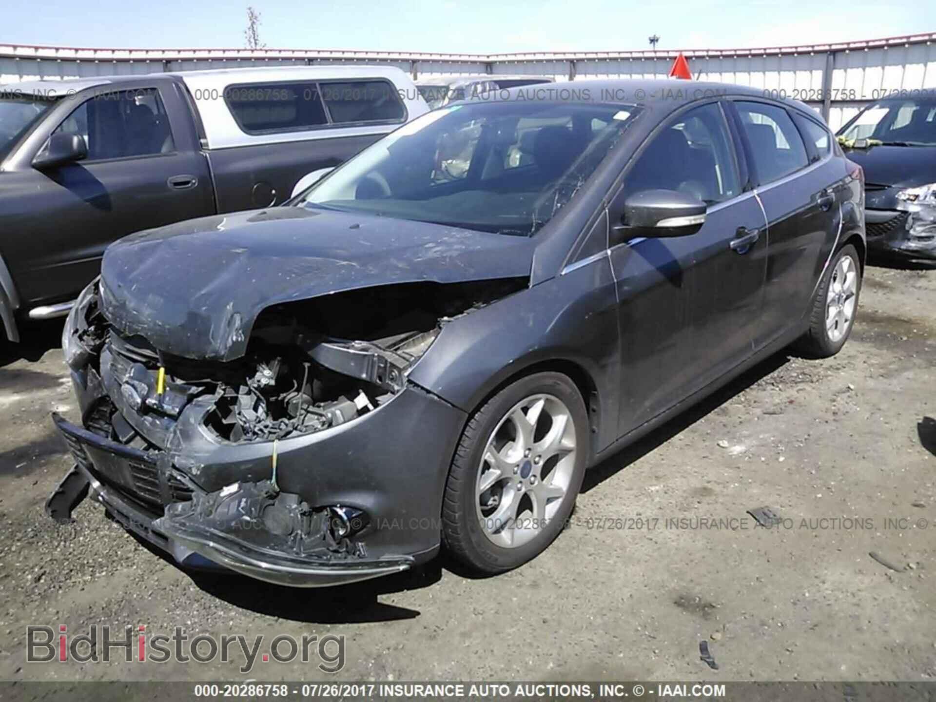 2014 Ford Focus - VIN: 1FADP3N24EL260096 - Фото 2