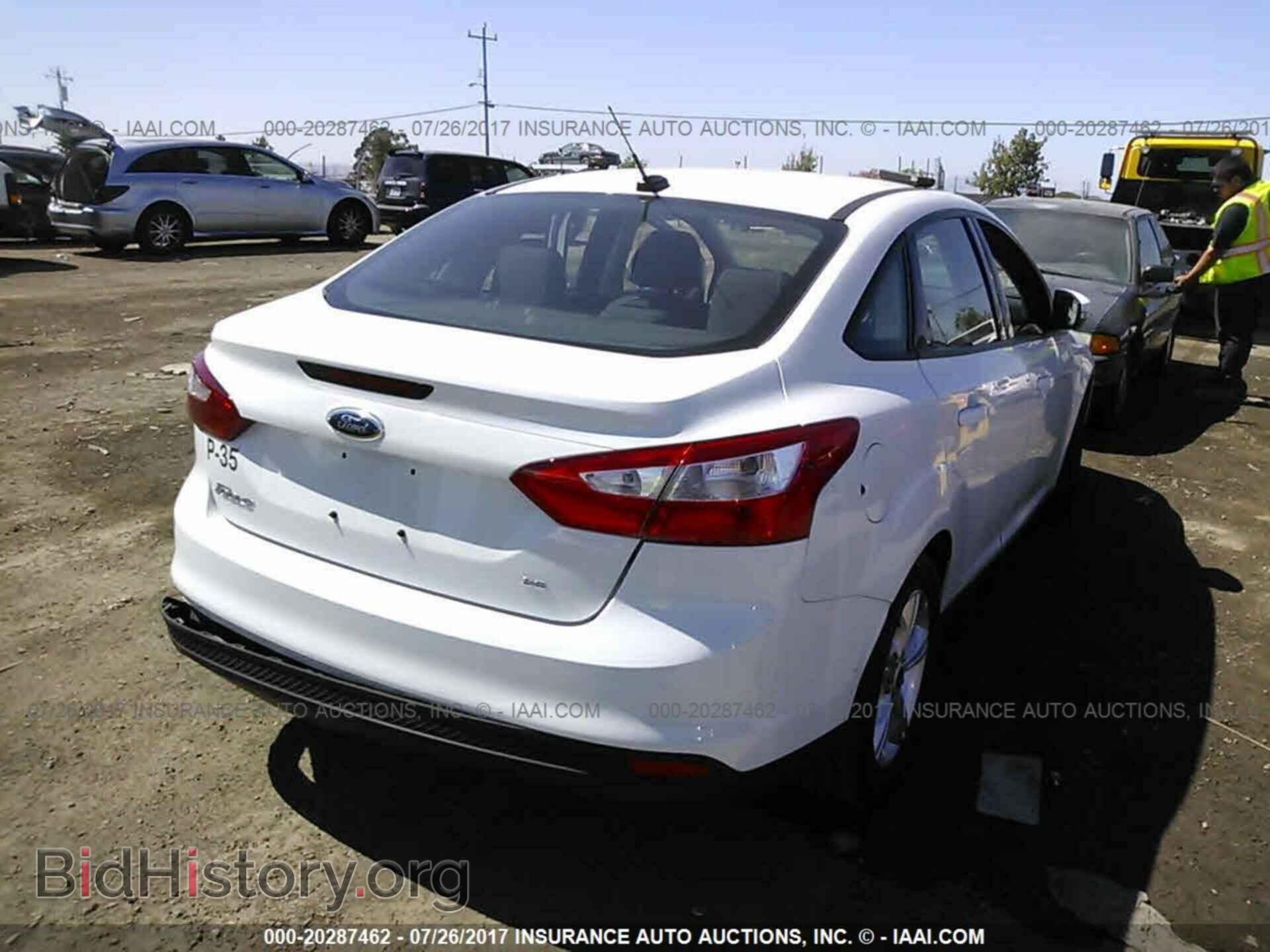 2014 Ford Focus - VIN: 1FADP3F20EL350389 - Фото 4