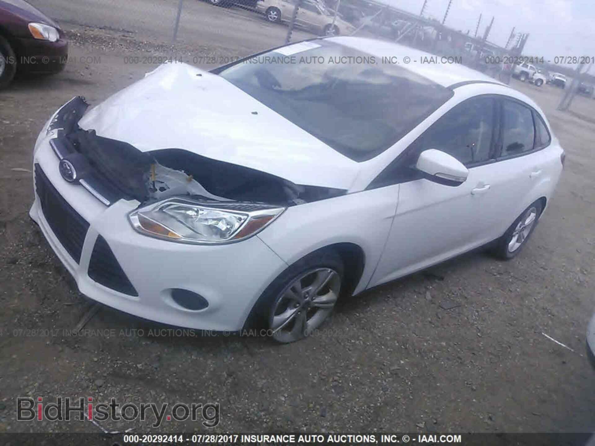 2014 Ford Focus - VIN: 1FADP3F21EL228897 - Фото 2