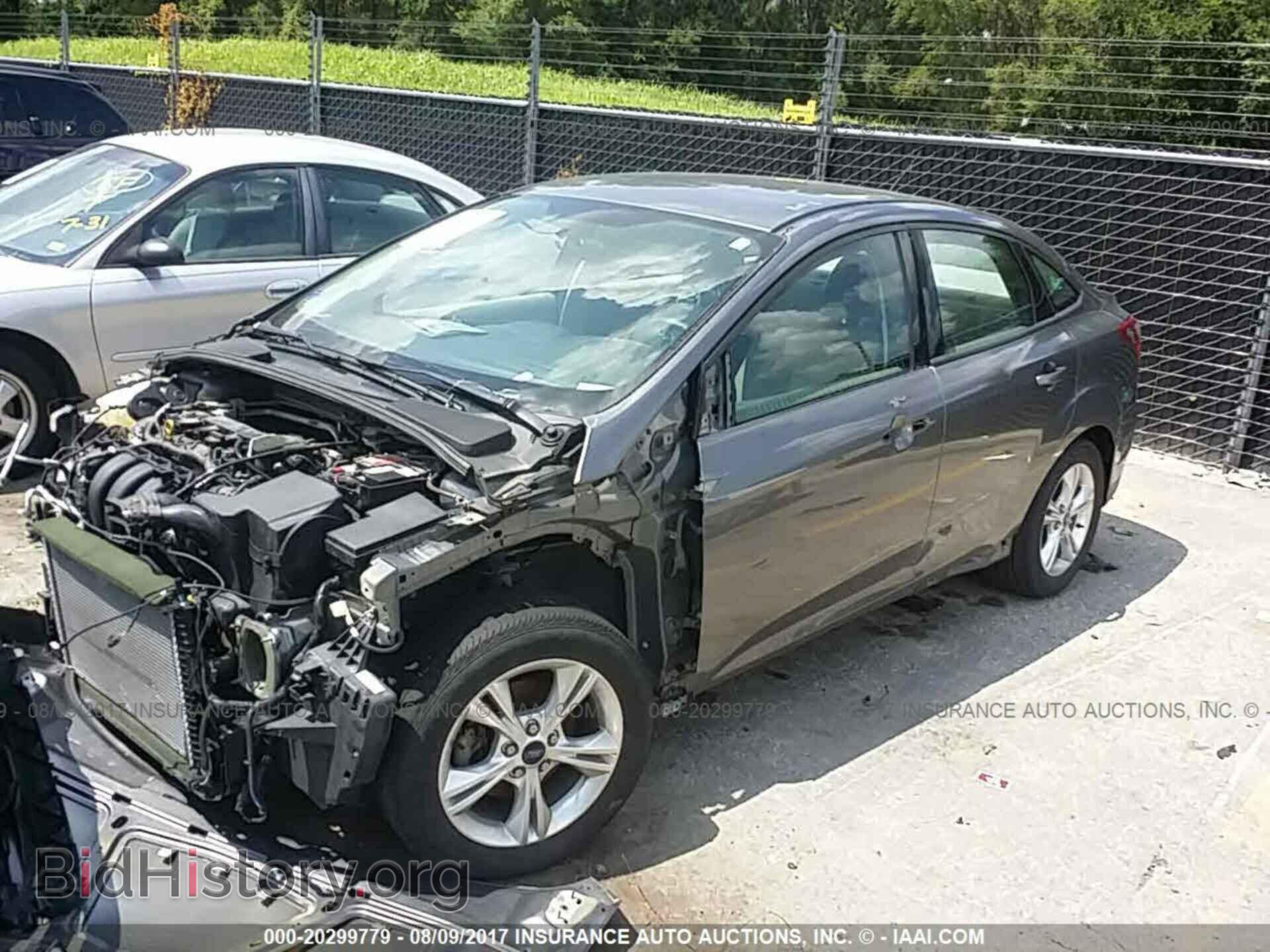 2014 Ford Focus - VIN: 1FADP3F21EL197327 - Photo 2