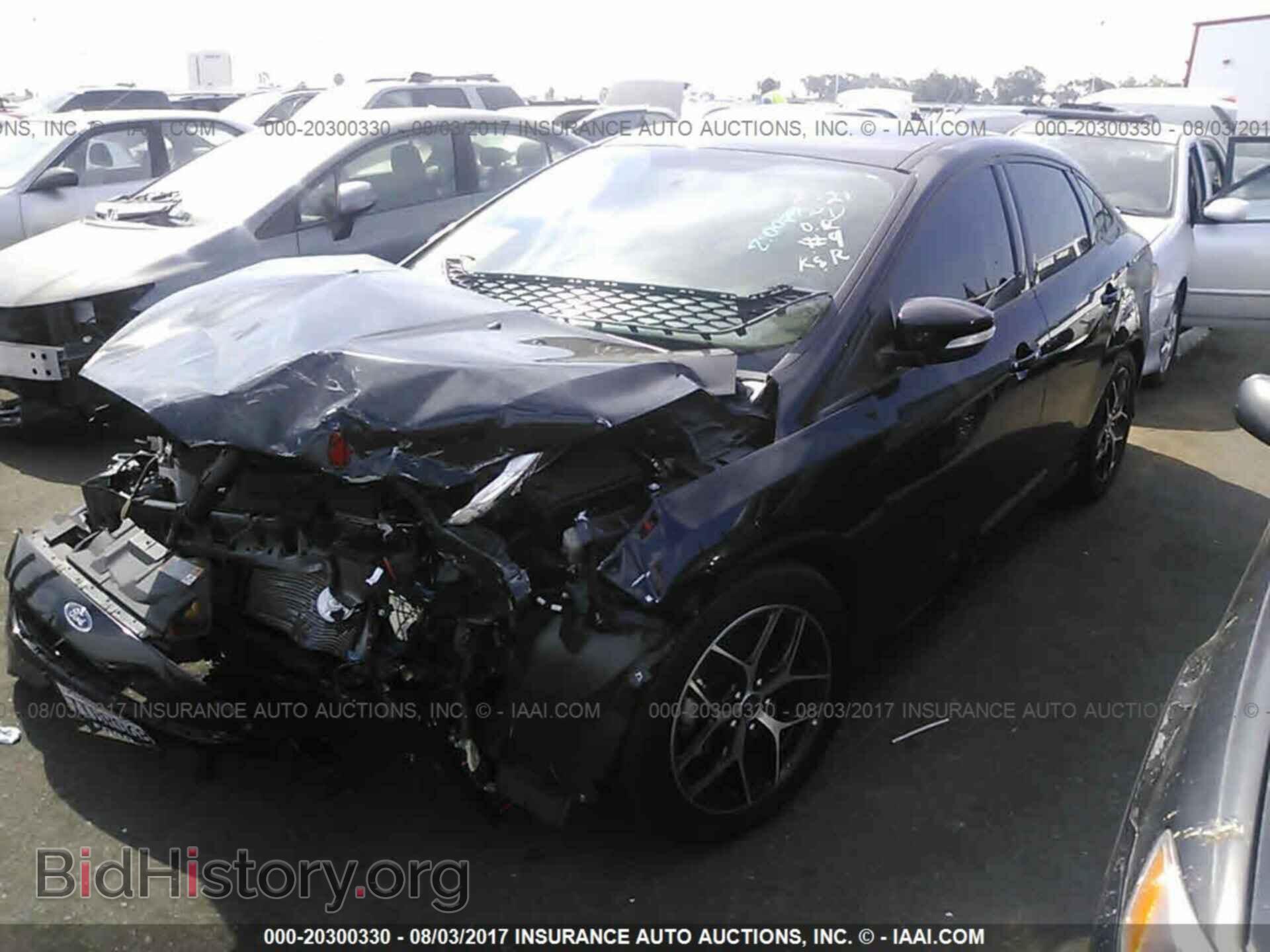 2016 Ford Focus - VIN: 1FADP3F28GL315389 - Photo 2