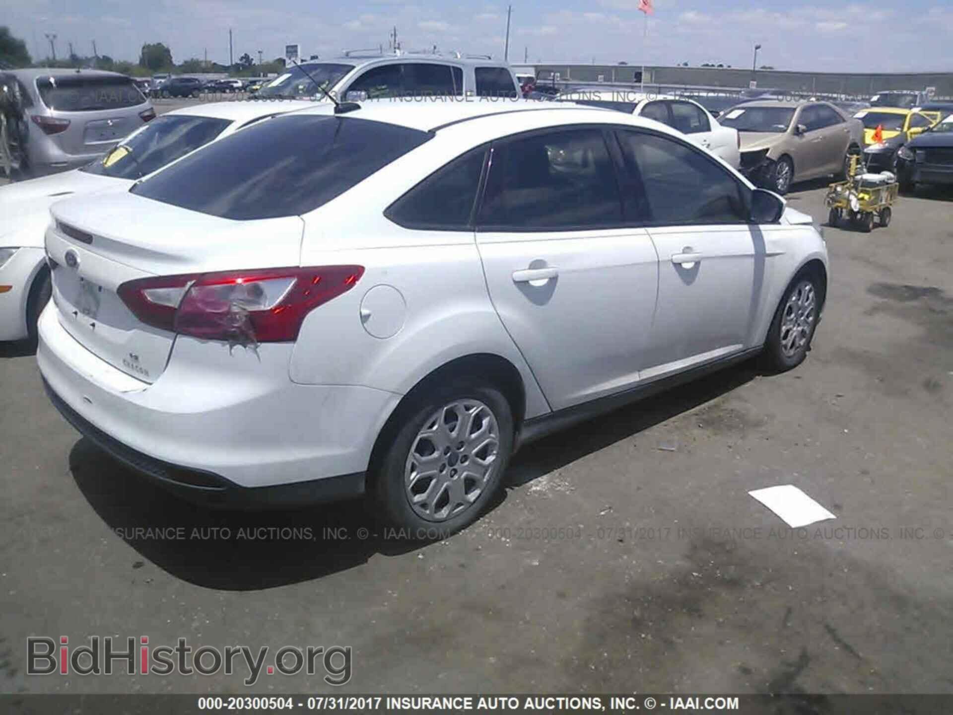 2012 Ford Focus - VIN: 1FAHP3F2XCL284321 - Photo 4