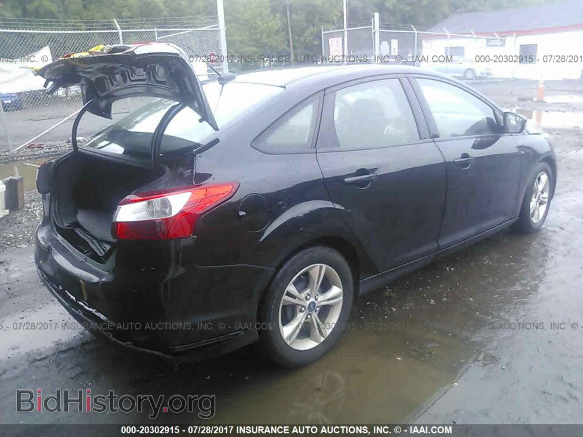2014 Ford Focus - VIN: 1FADP3F27EL309810 - Photo 4