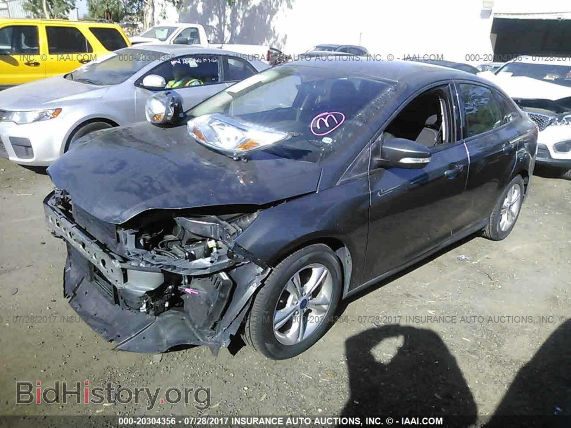2014 Ford Focus - VIN: 1FADP3F24EL407547 - Фото 2
