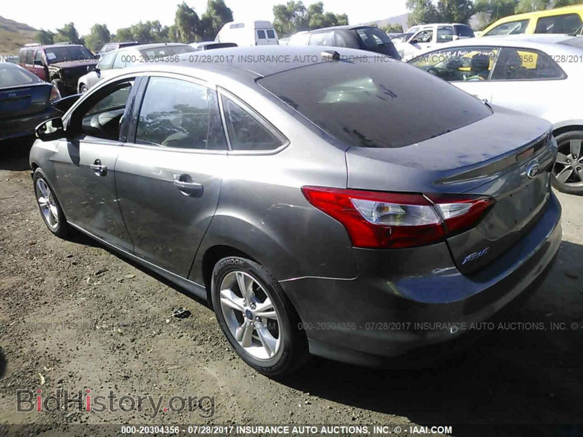 2014 Ford Focus - VIN: 1FADP3F24EL407547 - Фото 3