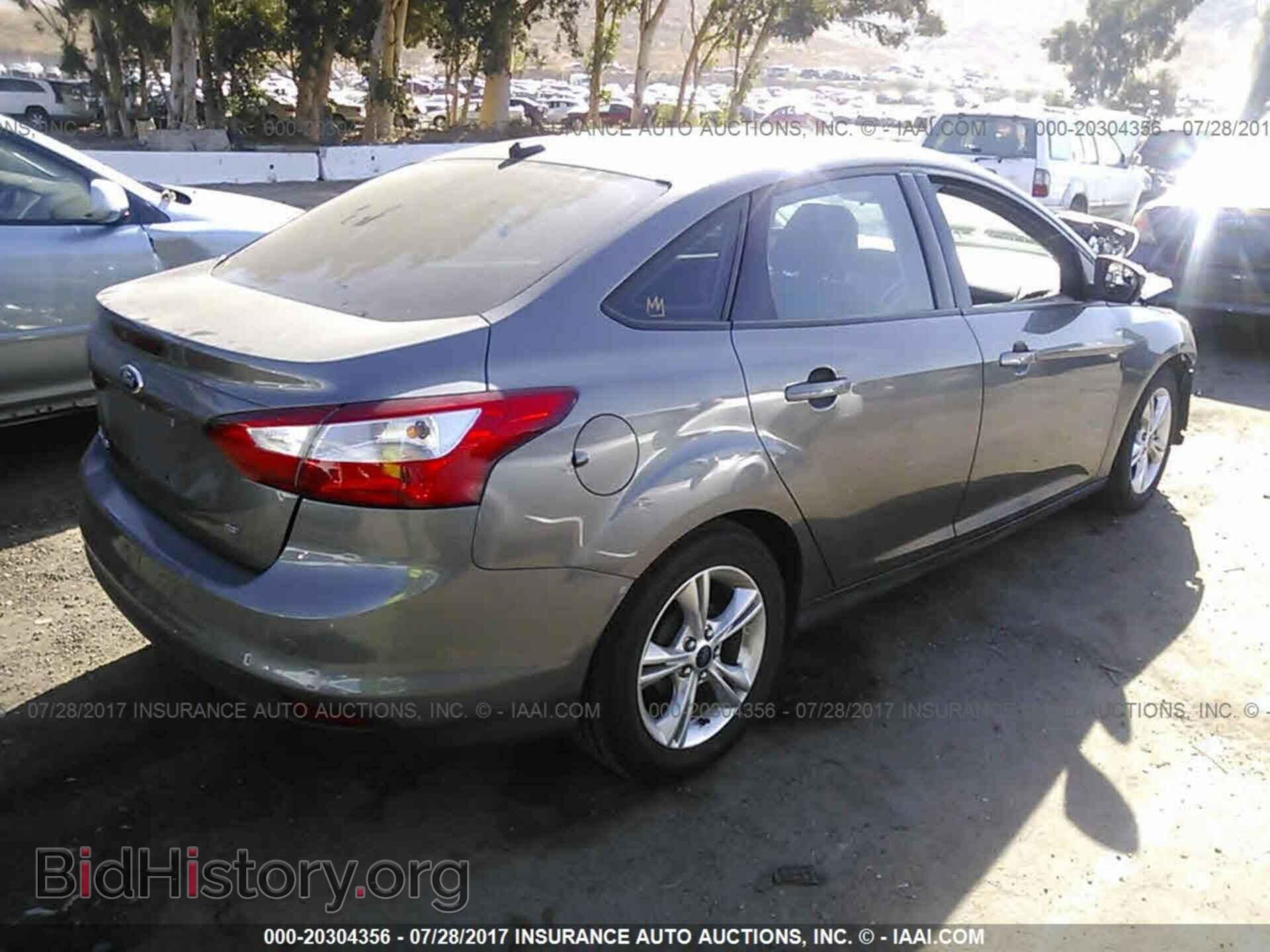 2014 Ford Focus - VIN: 1FADP3F24EL407547 - Фото 4