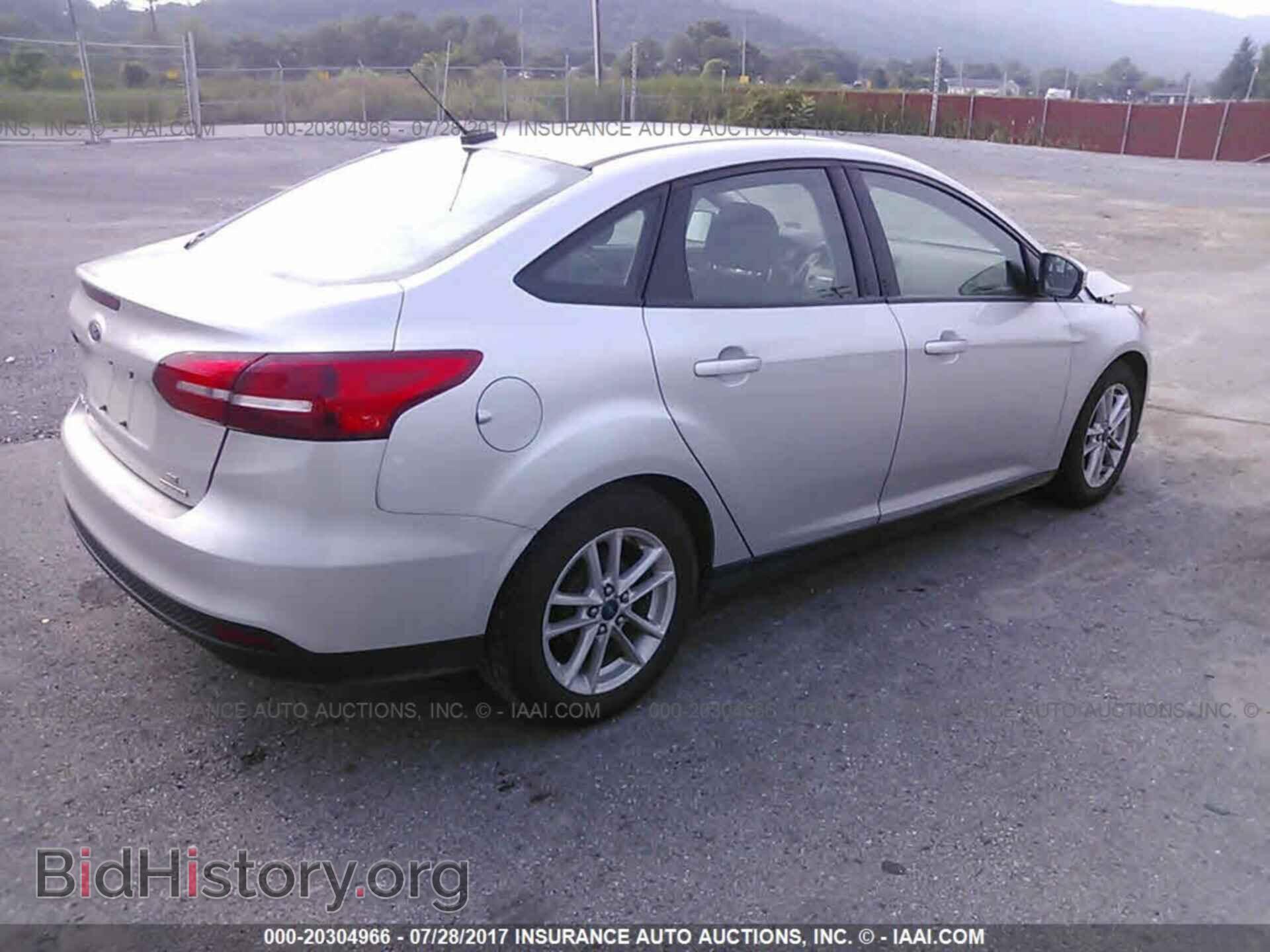 2015 Ford Focus - VIN: 1FADP3F22FL206201 - Photo 4