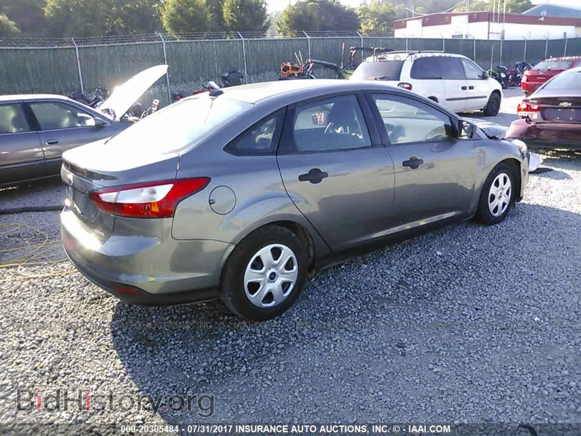 2013 Ford Focus - VIN: 1FADP3E27DL270409 - Фото 4