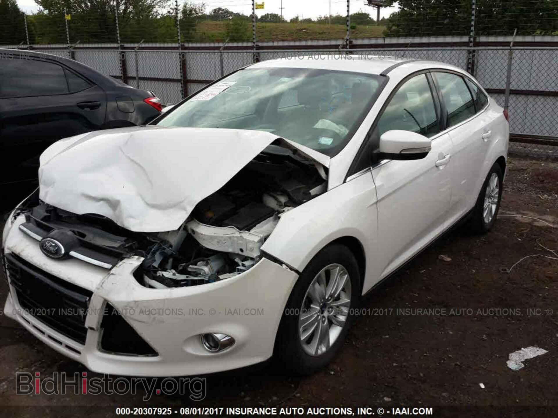 2012 Ford Focus - VIN: 1FAHP3H20CL367687 - Photo 2