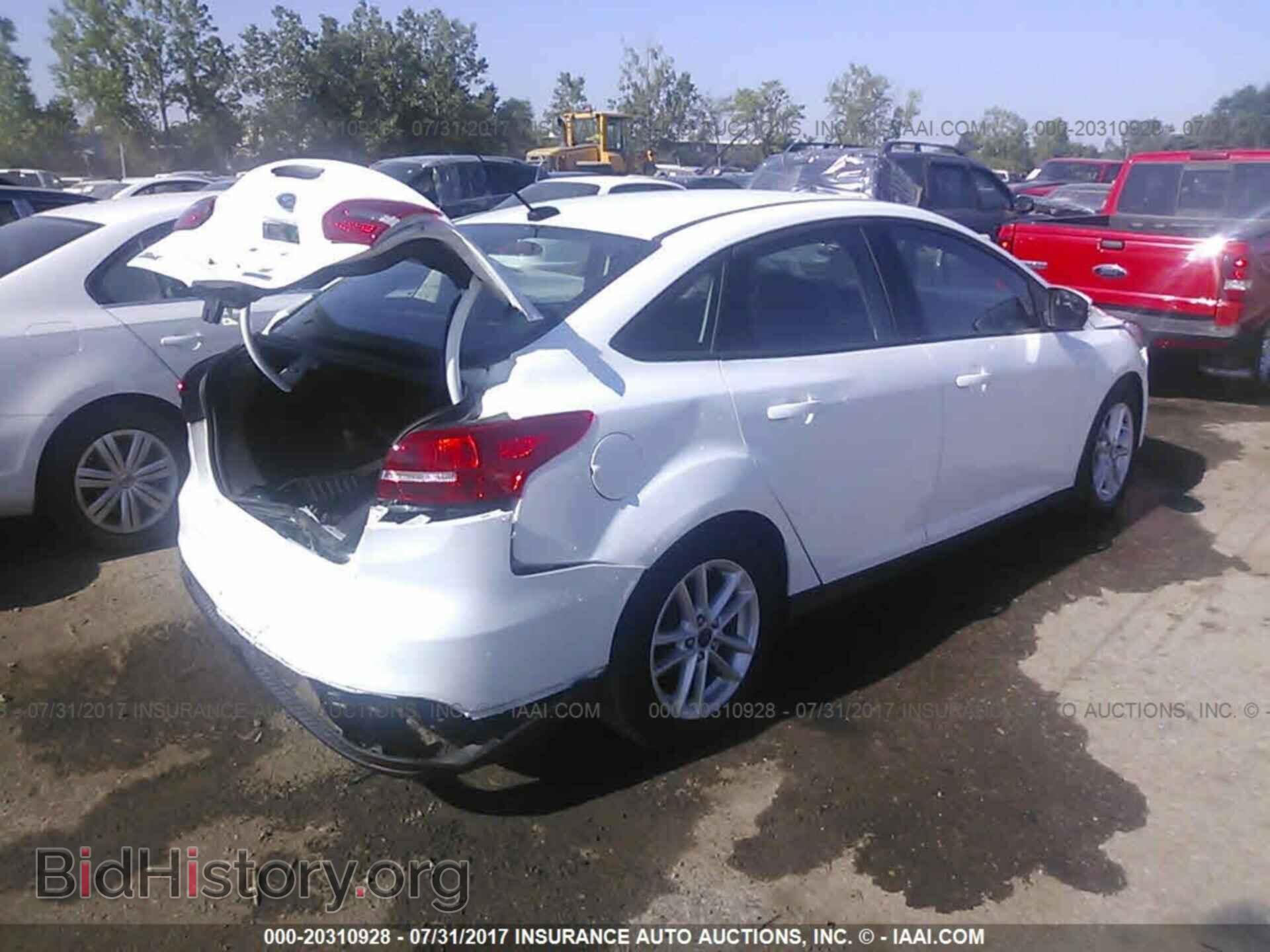 2016 Ford Focus - VIN: 1FADP3F25GL314622 - Photo 4