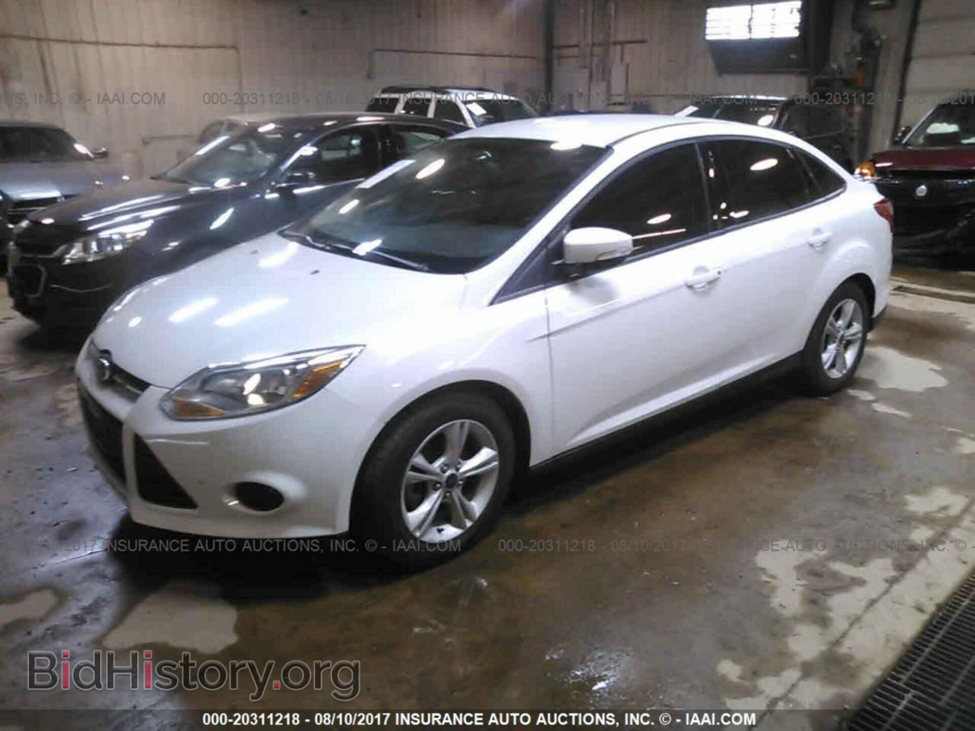 2014 Ford Focus - VIN: 1FADP3F28EL406904 - Фото 2