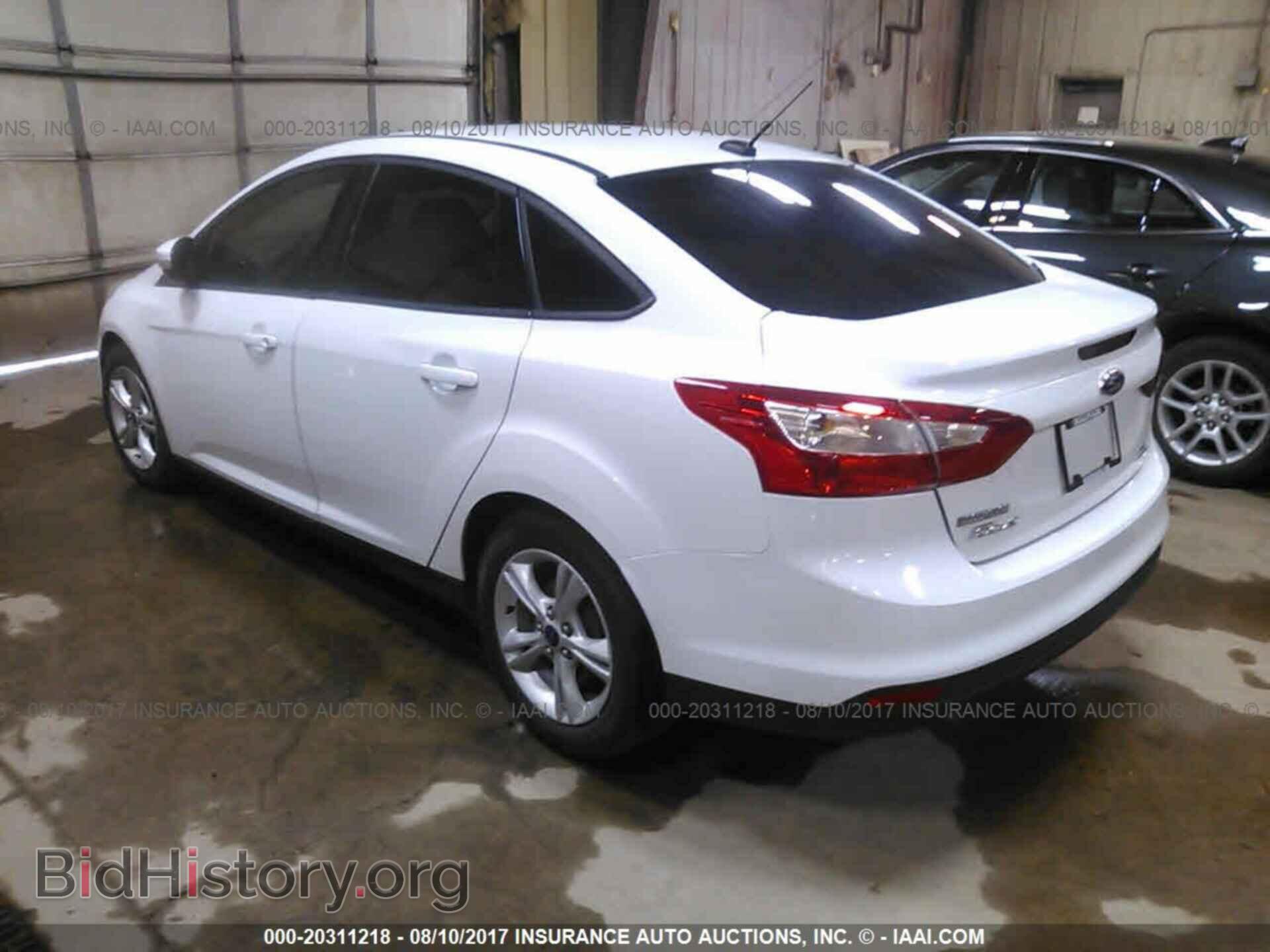 2014 Ford Focus - VIN: 1FADP3F28EL406904 - Фото 3