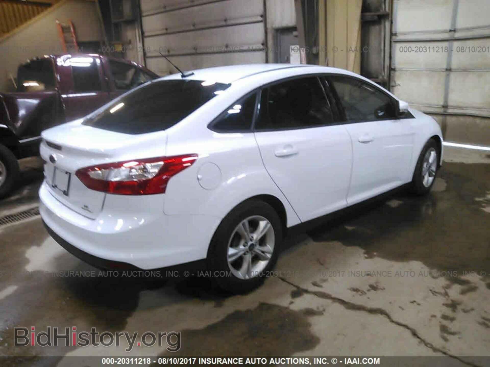 2014 Ford Focus - VIN: 1FADP3F28EL406904 - Фото 4