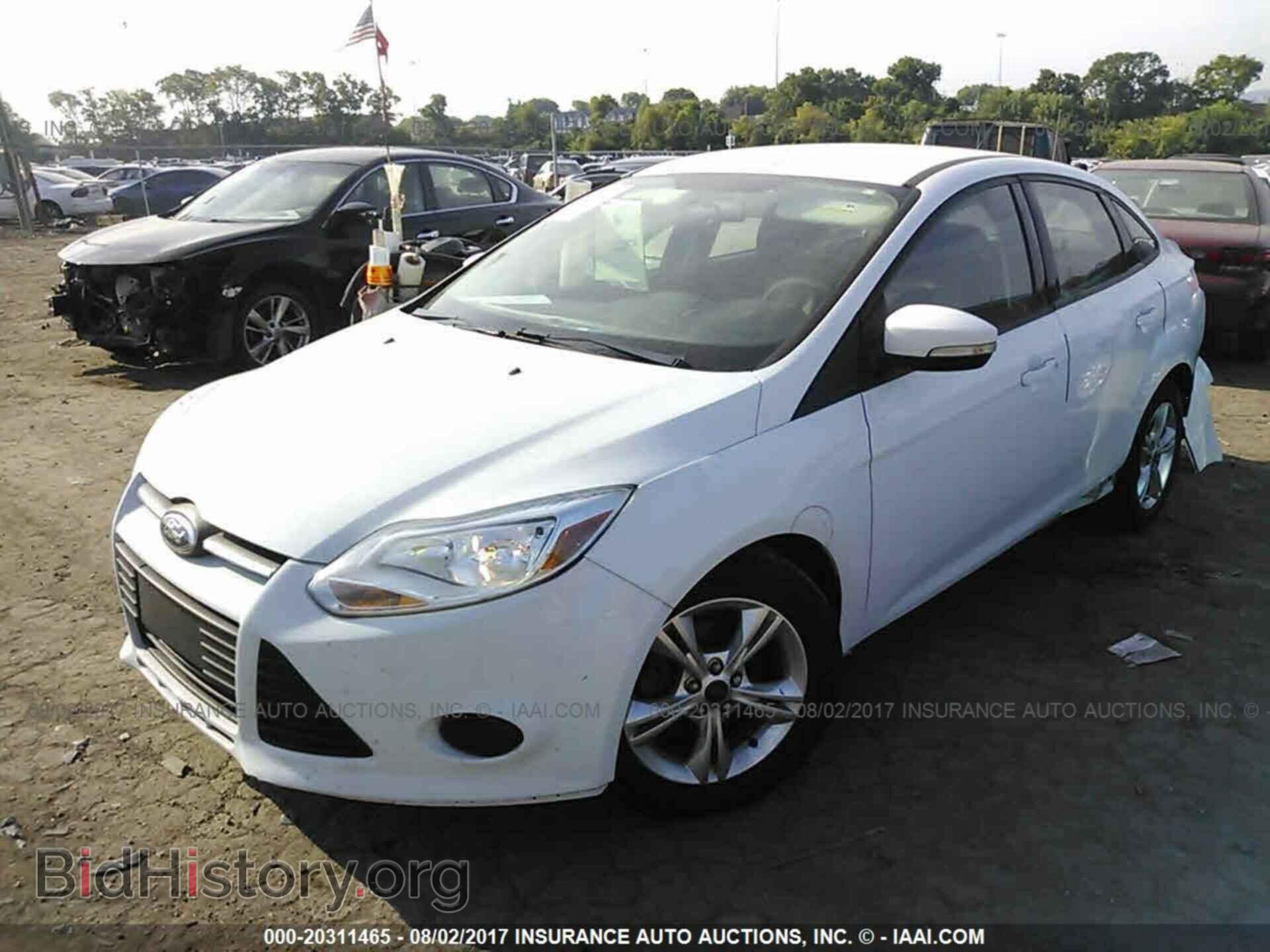 2013 Ford Focus - VIN: 1FADP3F21DL297748 - Фото 2