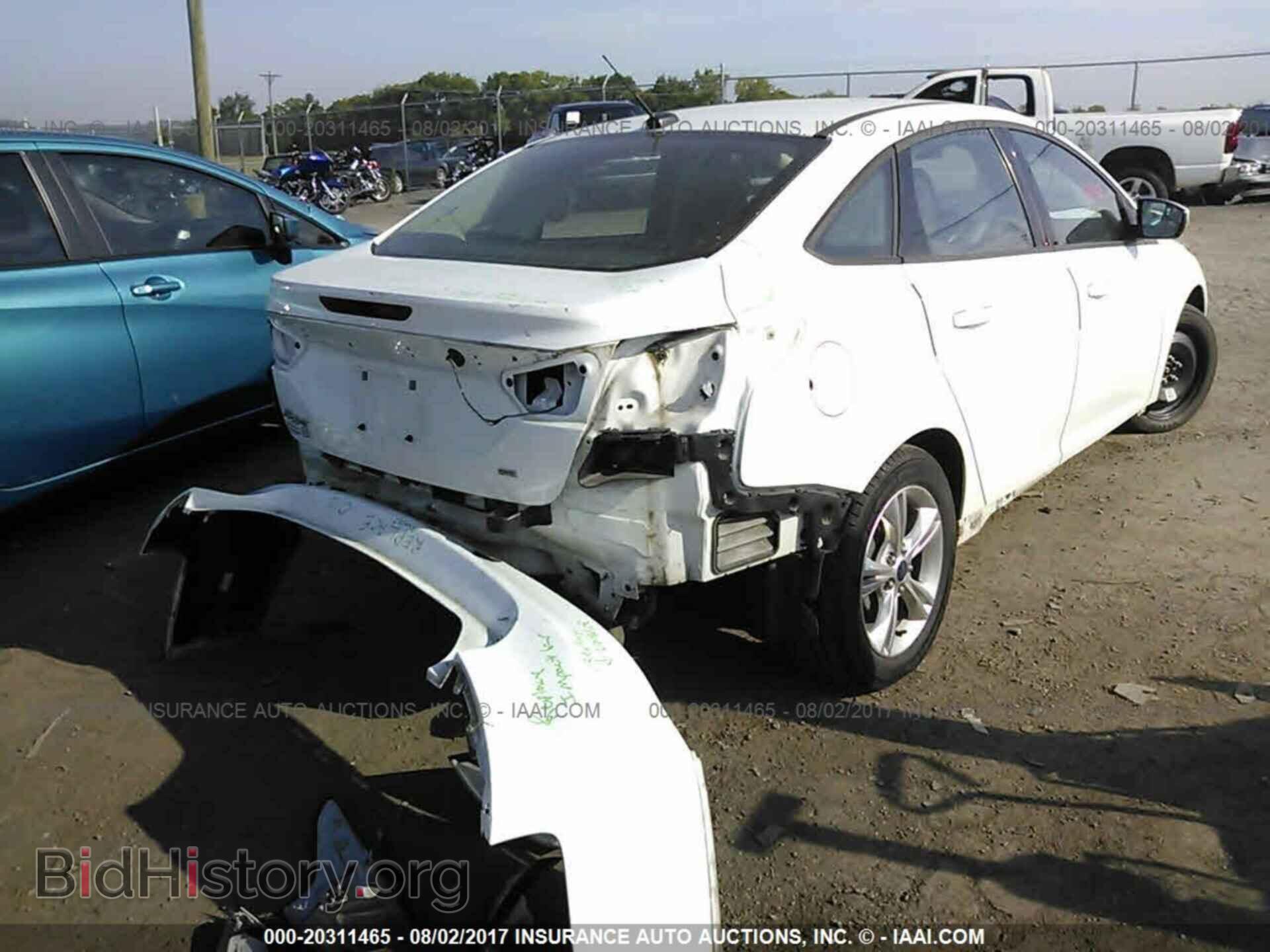 2013 Ford Focus - VIN: 1FADP3F21DL297748 - Фото 4