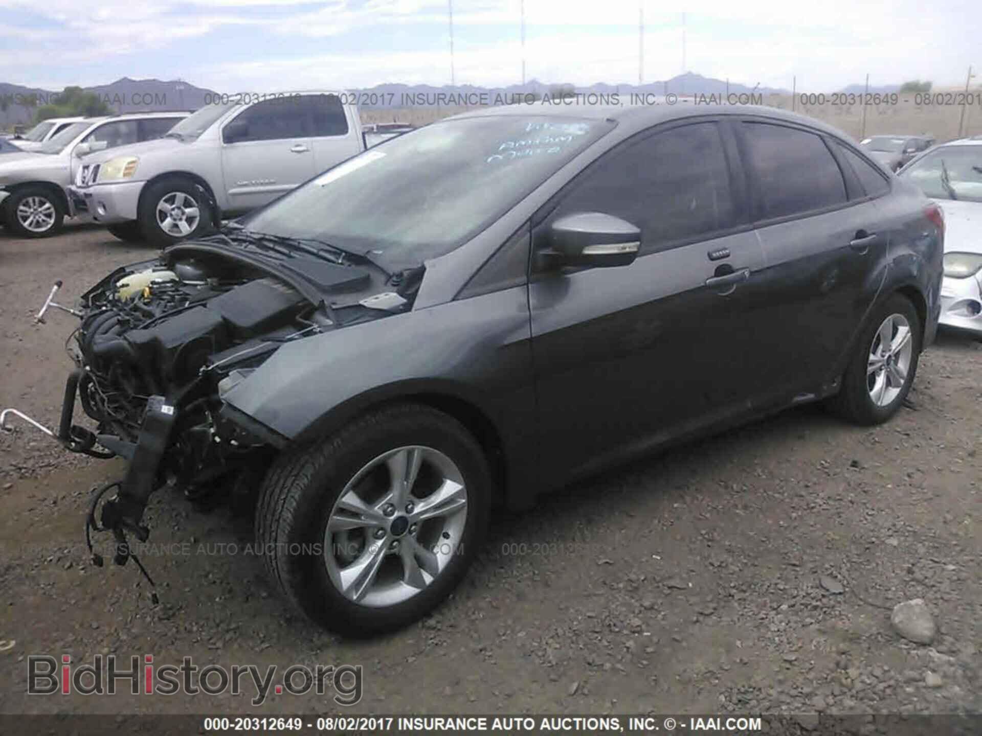 2014 Ford Focus - VIN: 1FADP3F21EL237907 - Photo 2