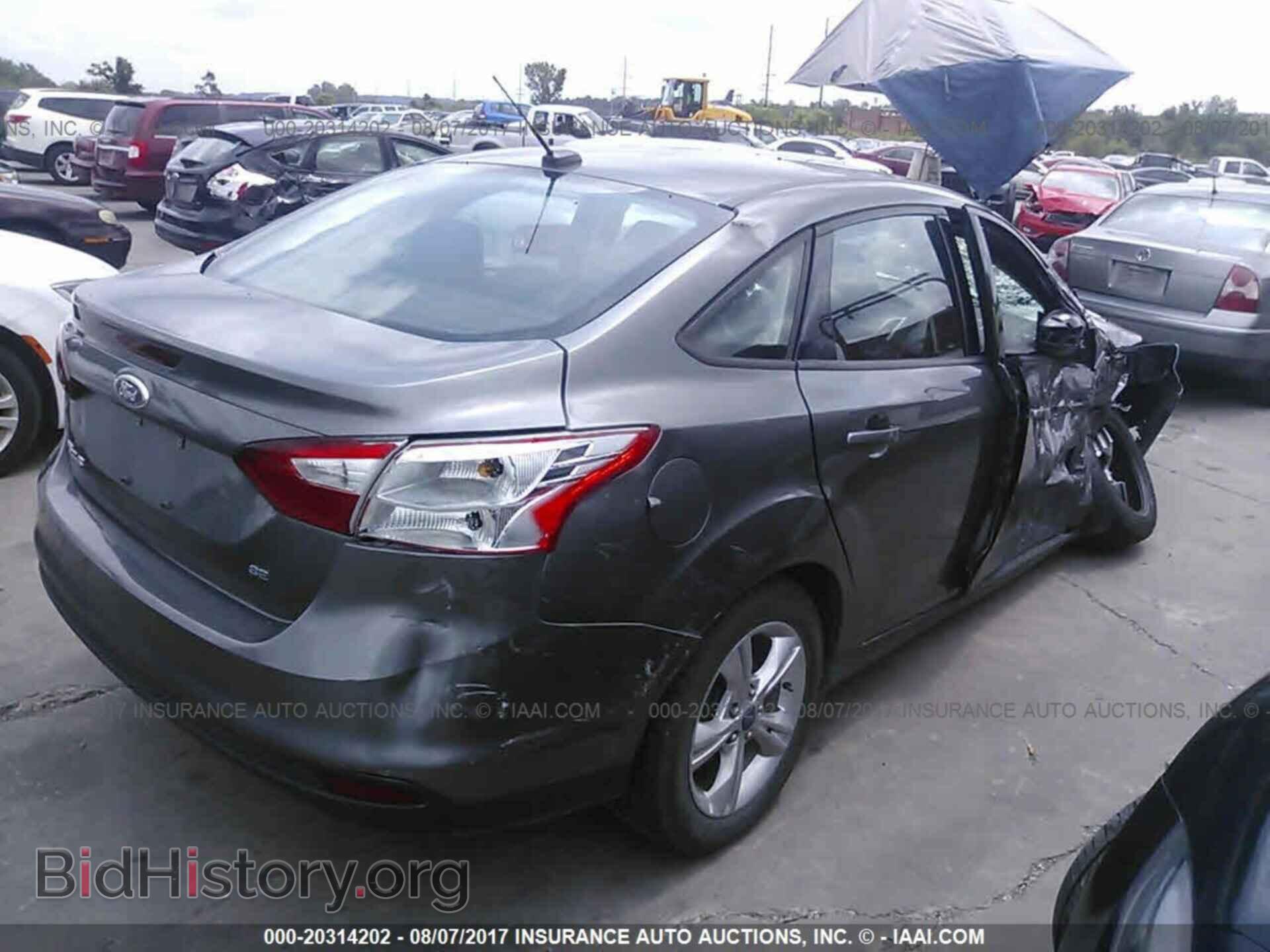2013 Ford Focus - VIN: 1FADP3F20DL285848 - Фото 4