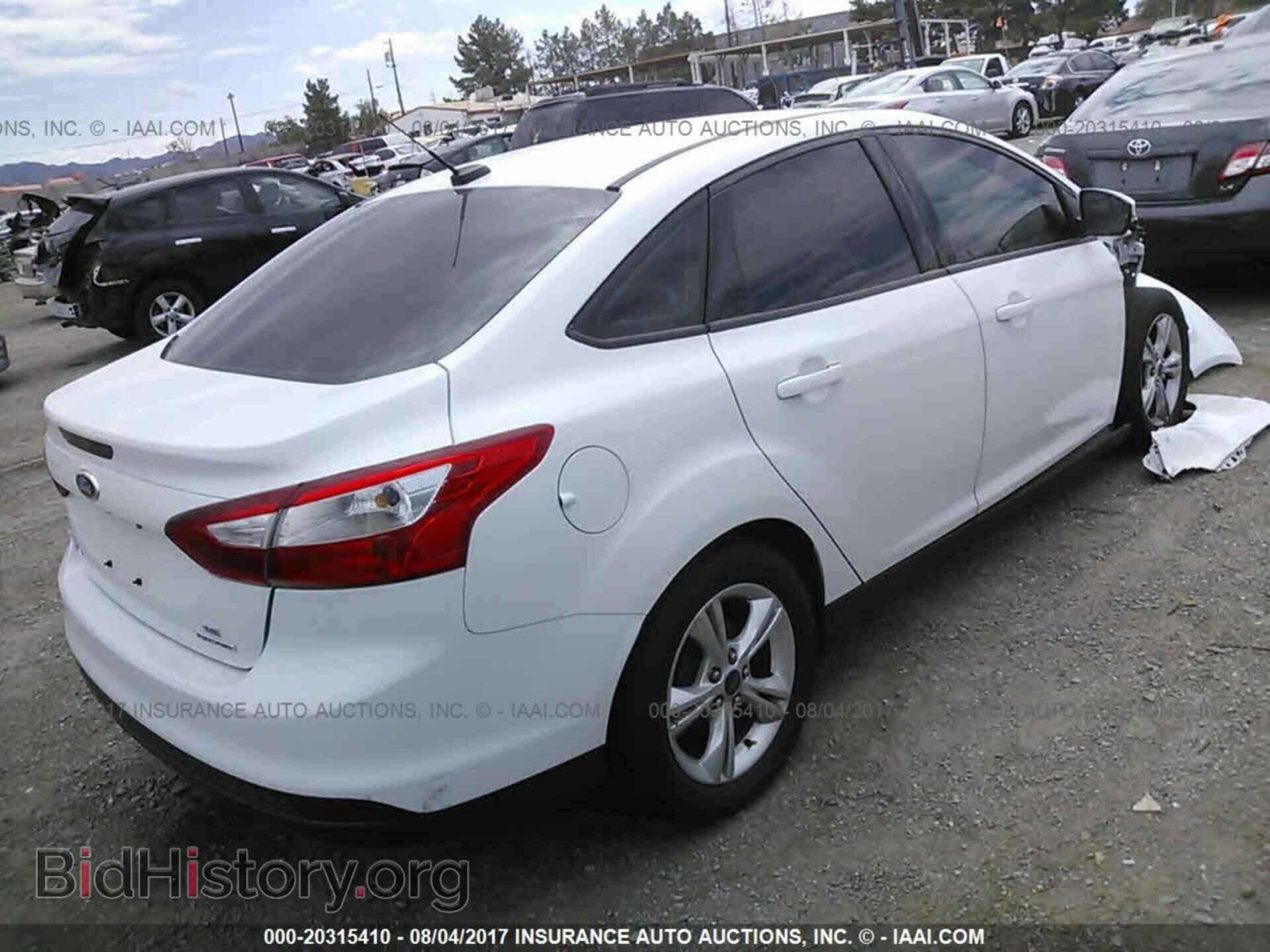 2013 Ford Focus - VIN: 1FADP3F2XDL363133 - Photo 4