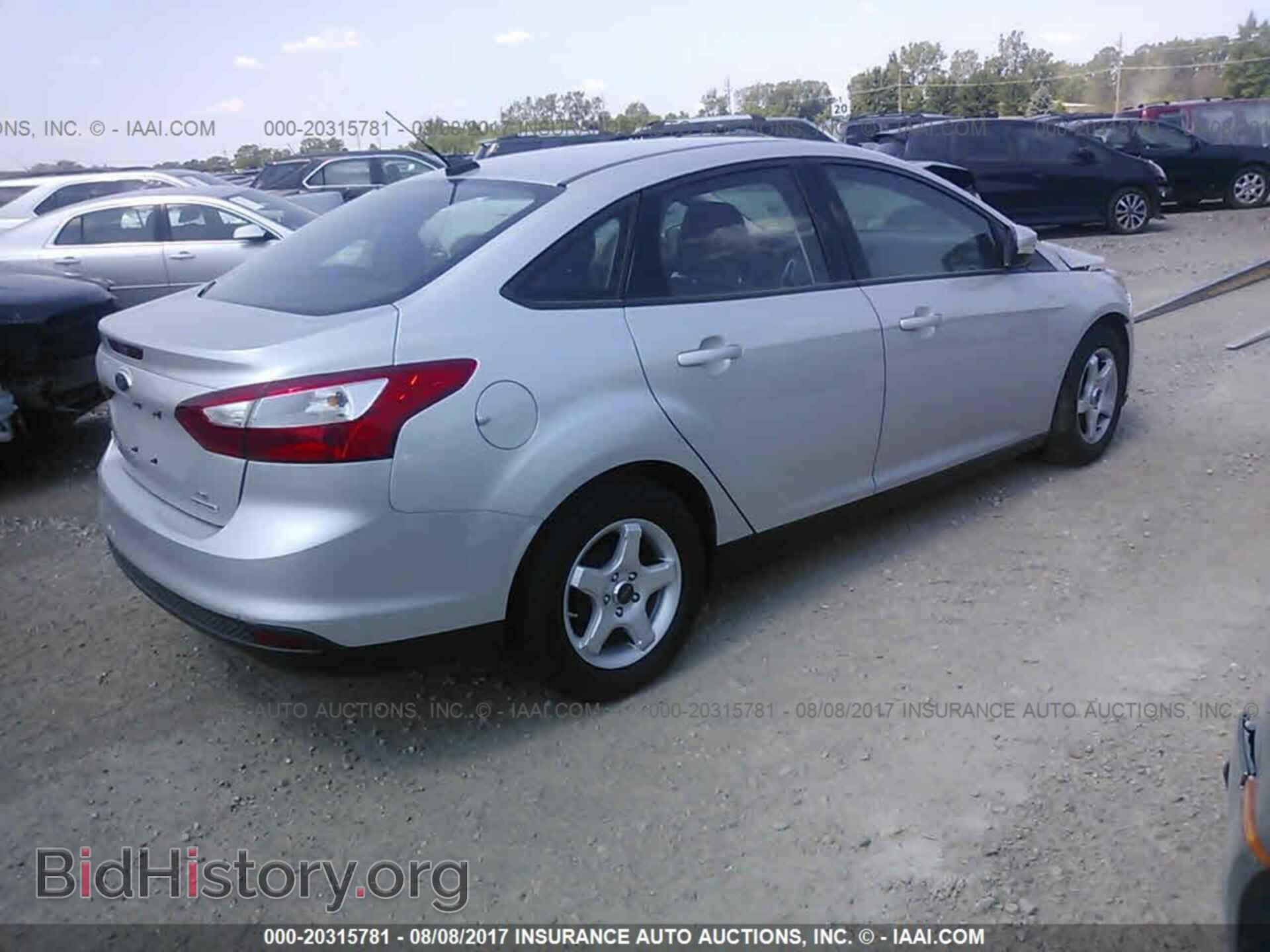 2014 Ford Focus - VIN: 1FADP3F2XEL207062 - Фото 4