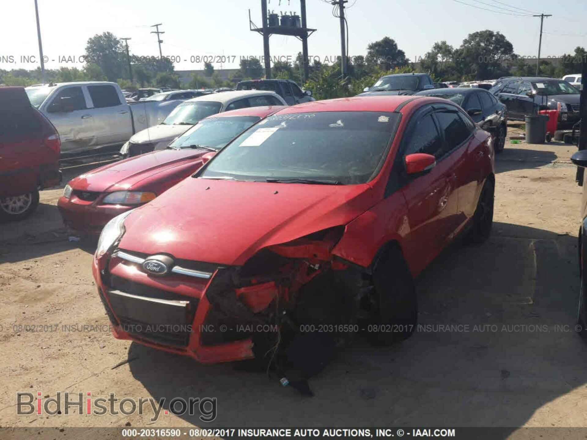 2014 Ford Focus - VIN: 1FADP3F21EL214109 - Фото 2