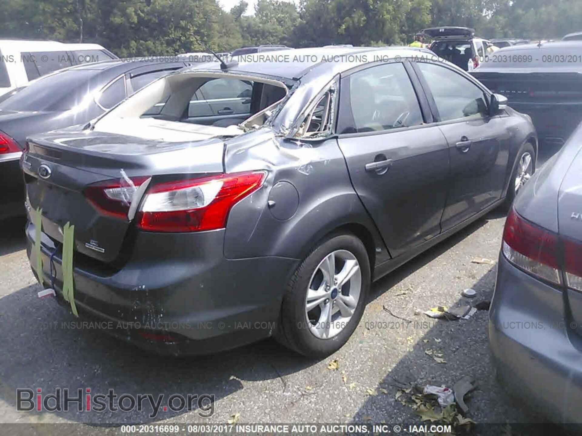2014 Ford Focus - VIN: 1FADP3F20EL440688 - Фото 4