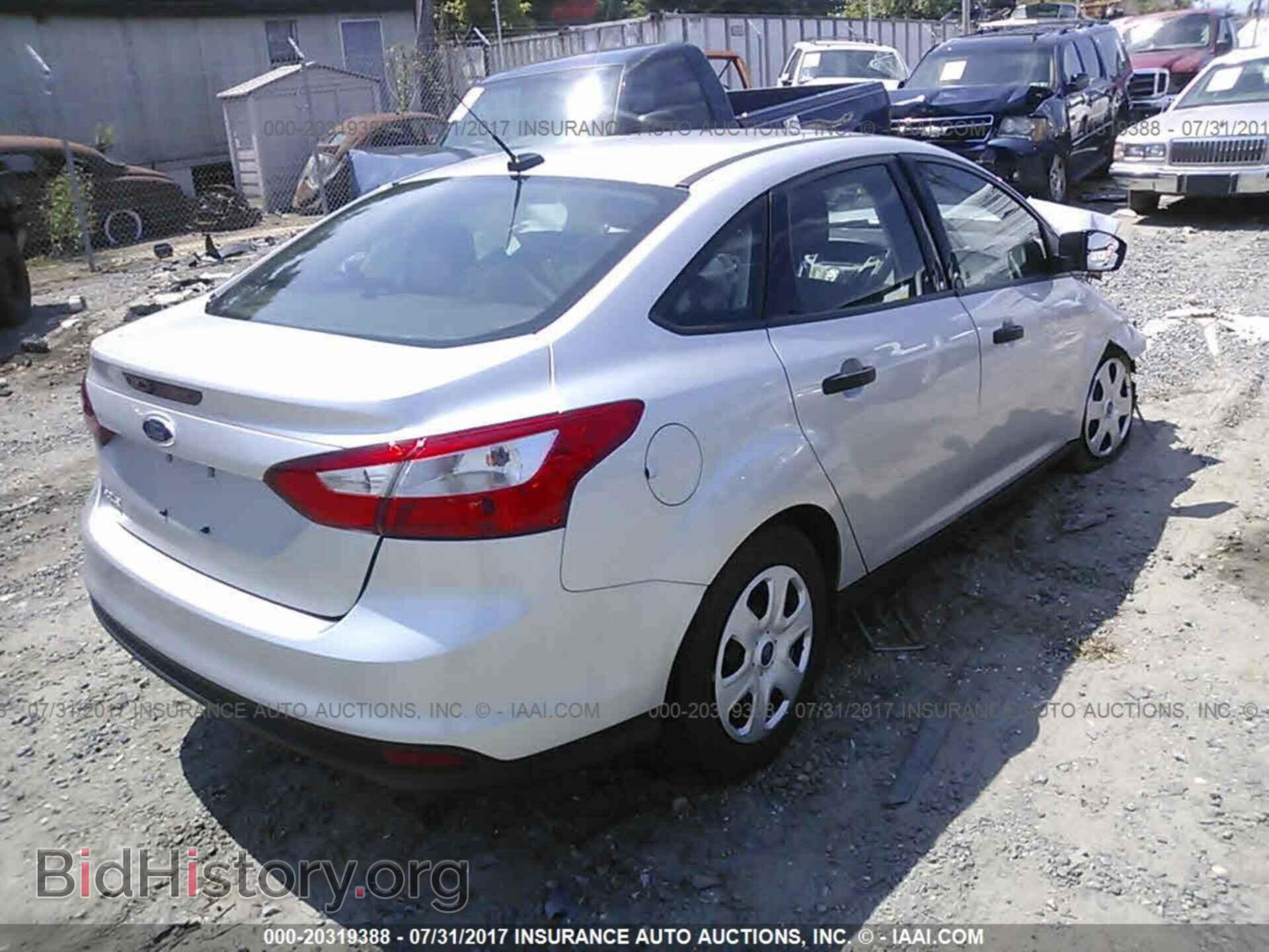 2014 Ford Focus - VIN: 1FADP3E27EL135934 - Photo 4