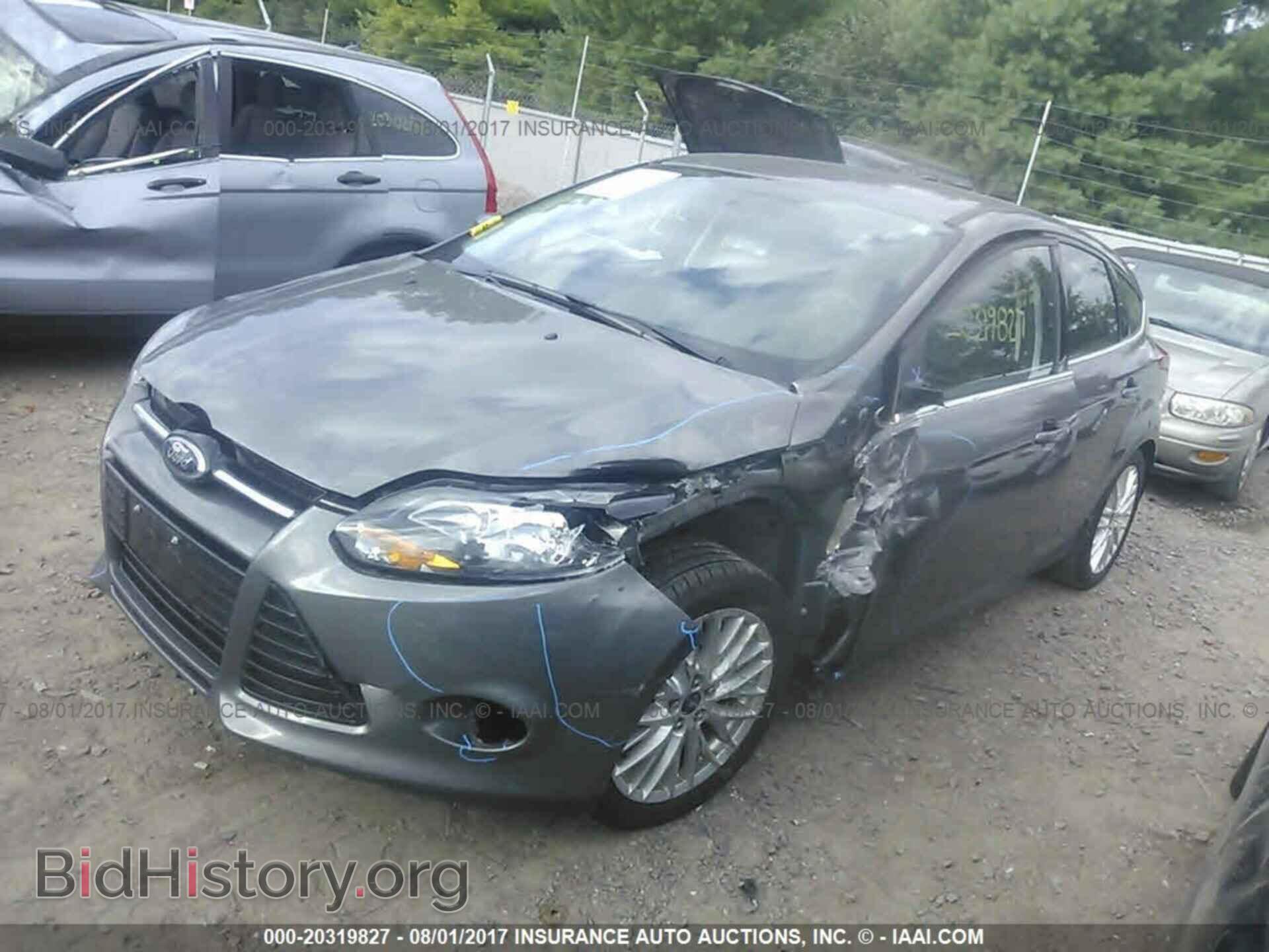 2014 Ford Focus - VIN: 1FADP3N25EL374088 - Фото 2