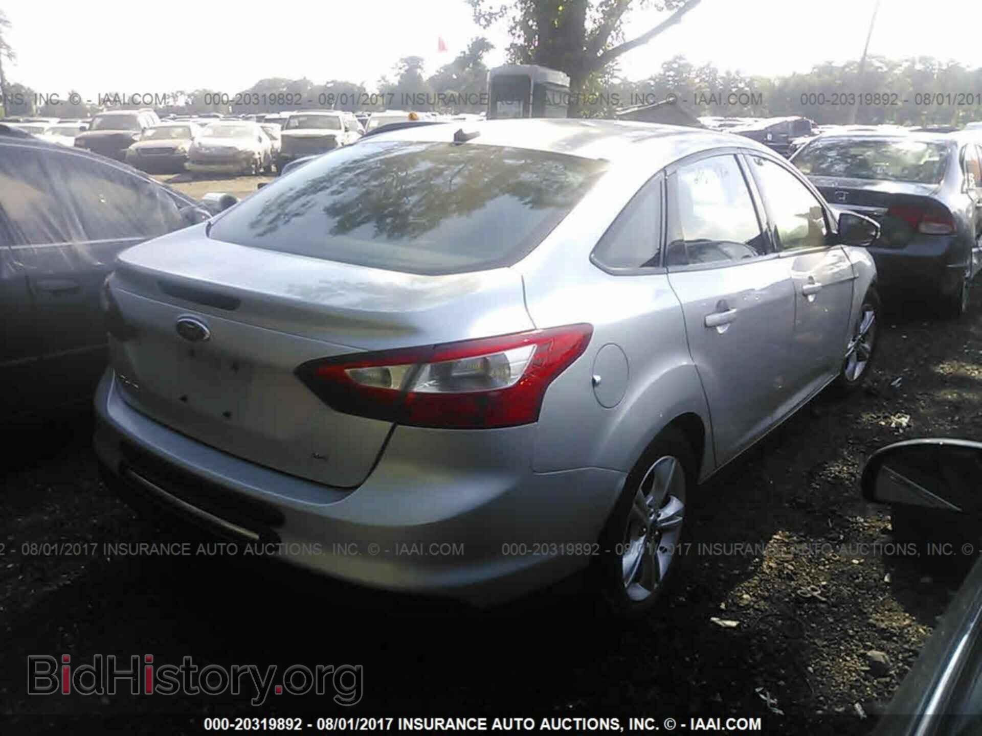 2014 Ford Focus - VIN: 1FADP3F20EL386275 - Фото 4