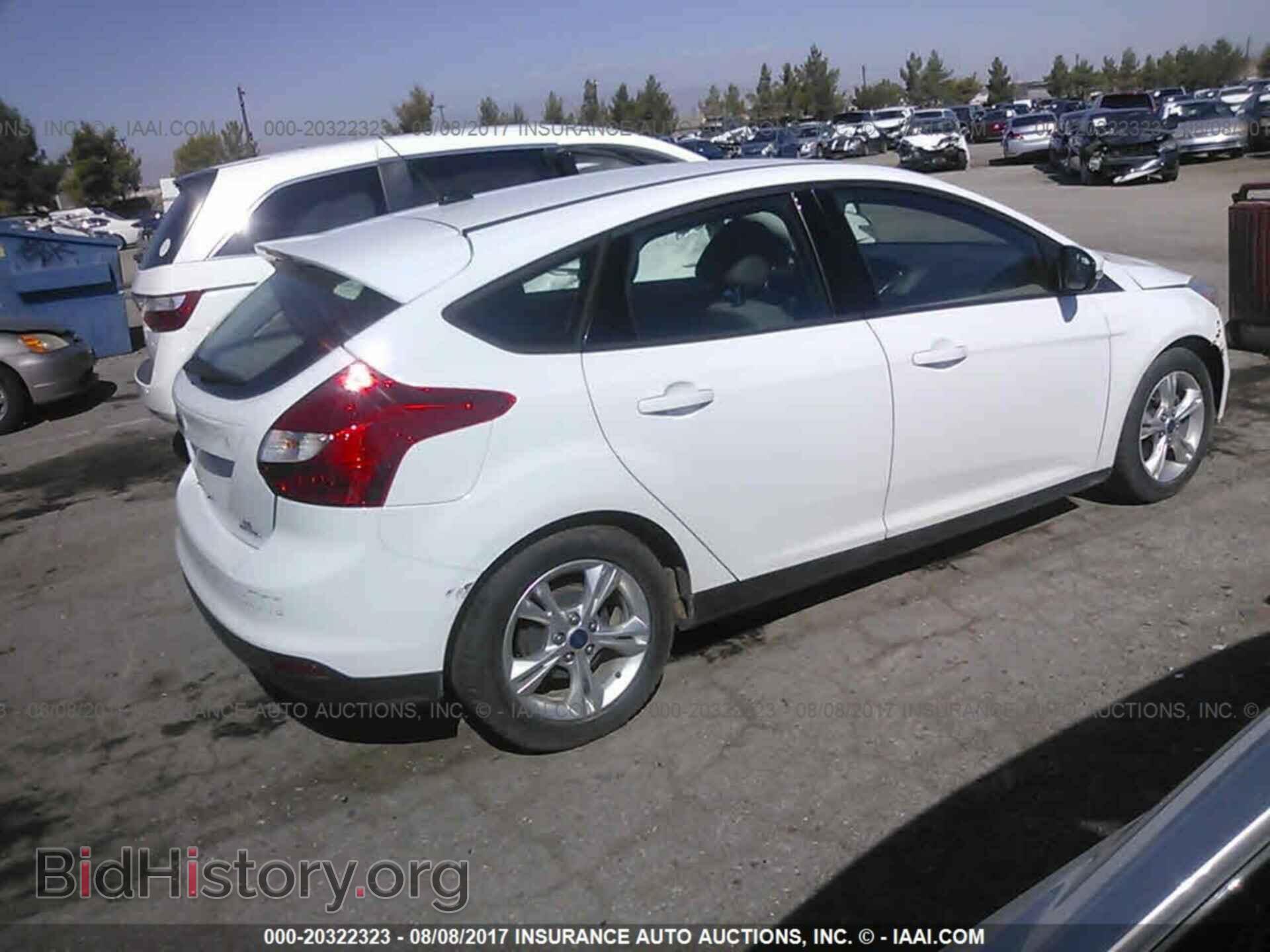 2014 Ford Focus - VIN: 1FADP3K29EL169944 - Фото 4