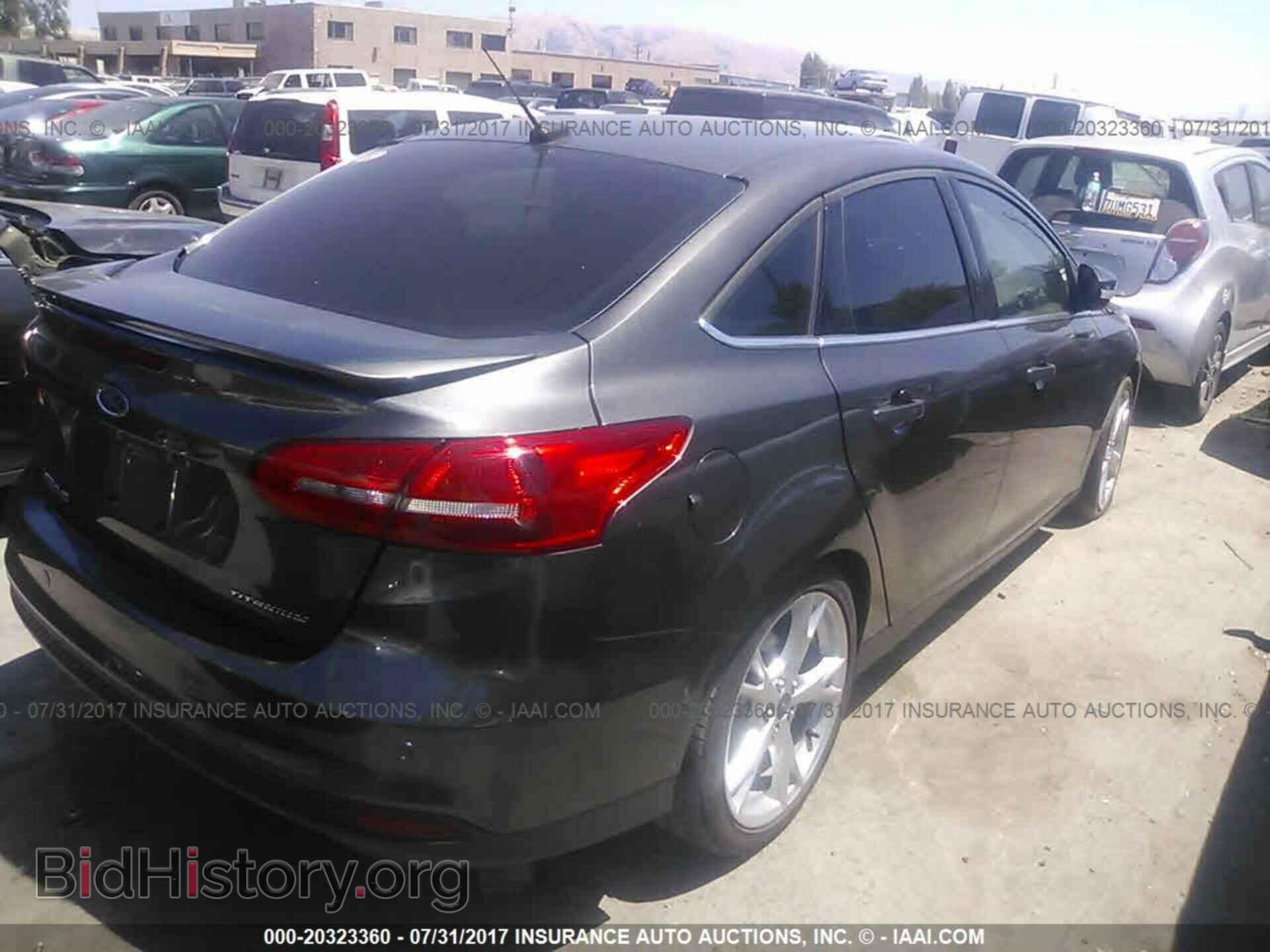 2016 Ford Focus - VIN: 1FADP3J29GL216202 - Фото 4