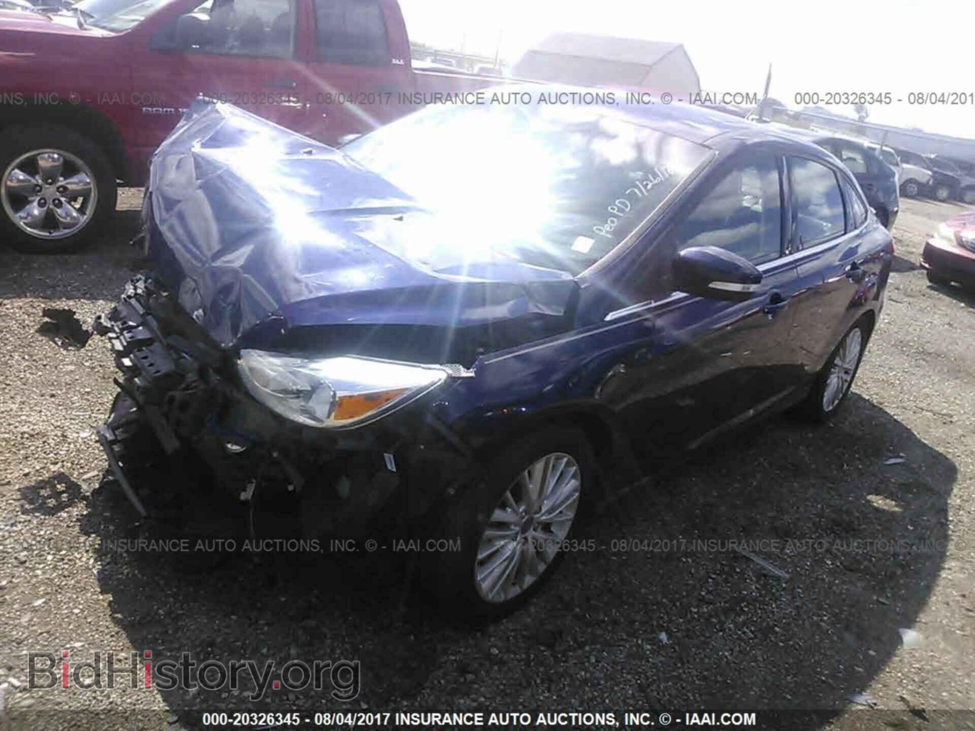 2016 Ford Focus - VIN: 1FADP3J23GL280588 - Photo 2