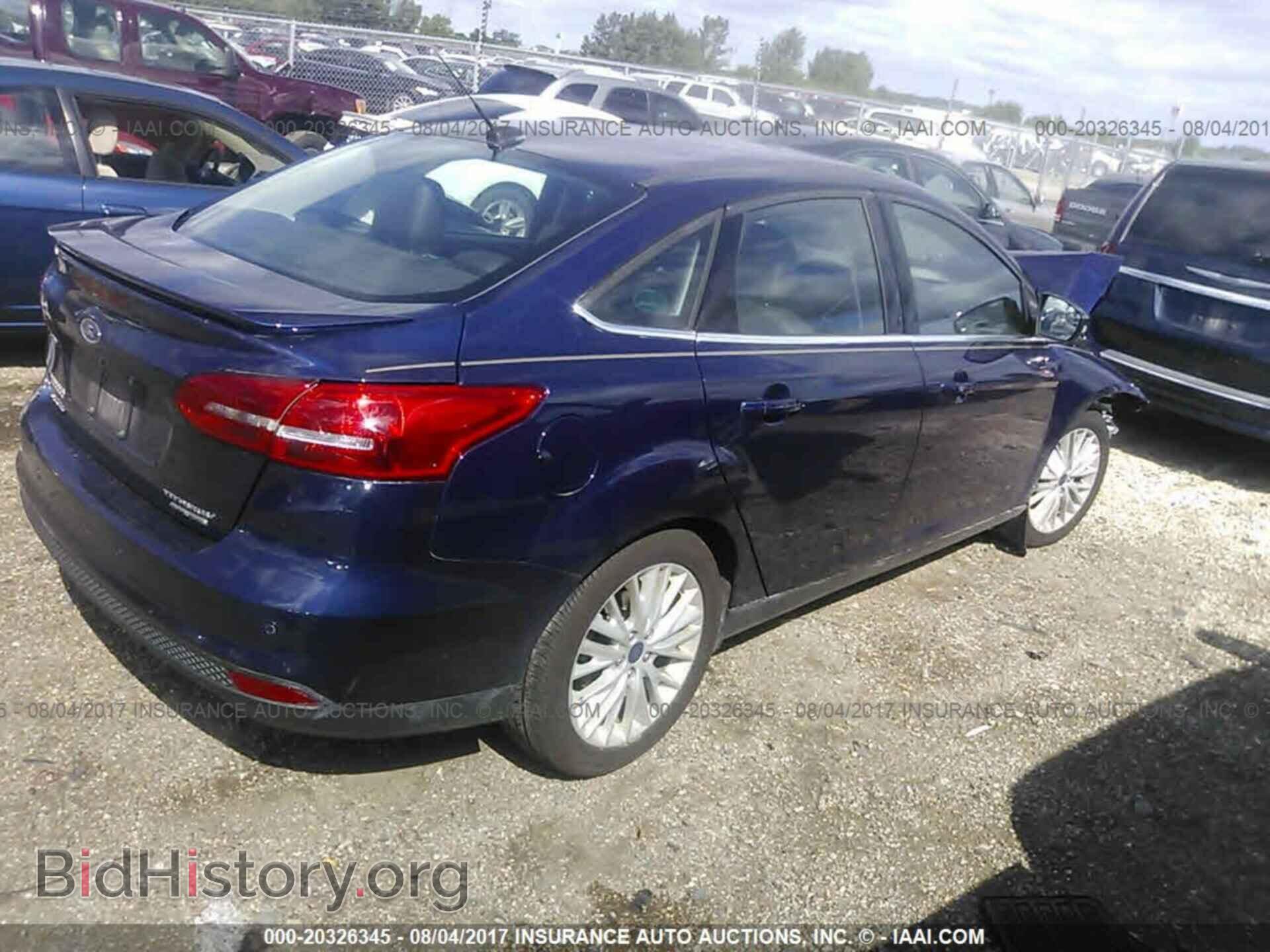 2016 Ford Focus - VIN: 1FADP3J23GL280588 - Photo 4