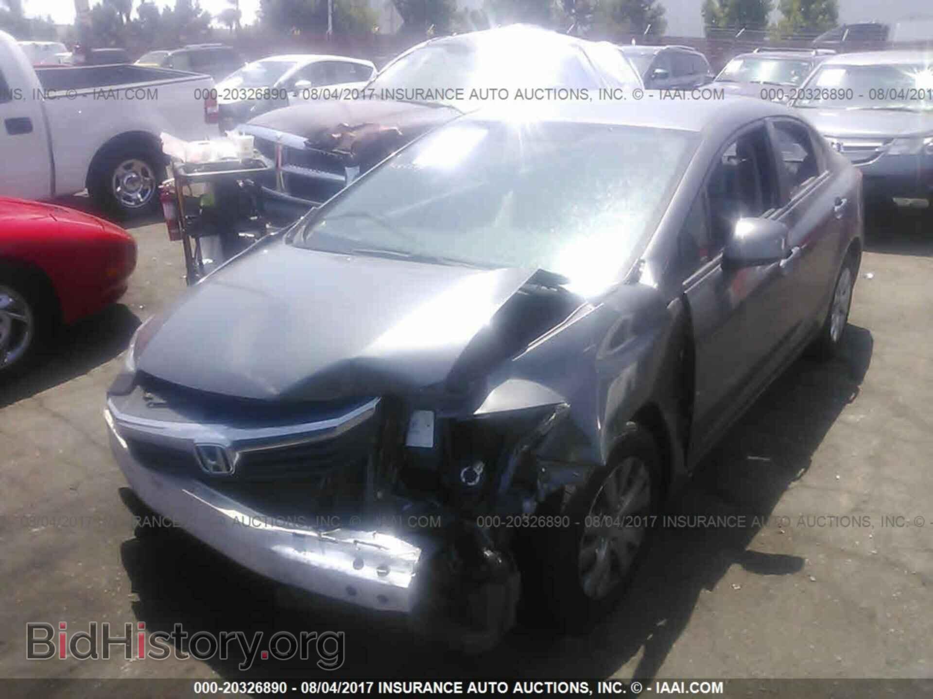 2012 Honda Civic - VIN: 19XFB2F58CE323372 - Photo 2