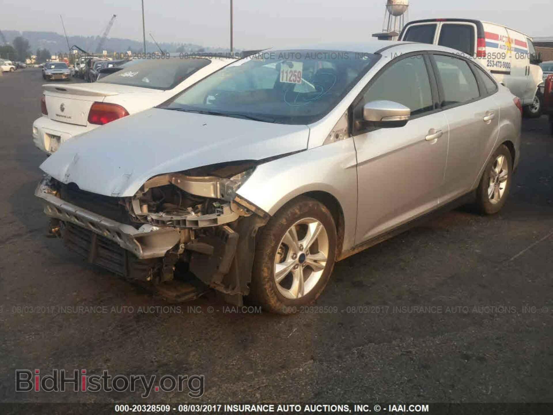 2014 Ford Focus - VIN: 1FADP3F24EL414434 - Фото 2