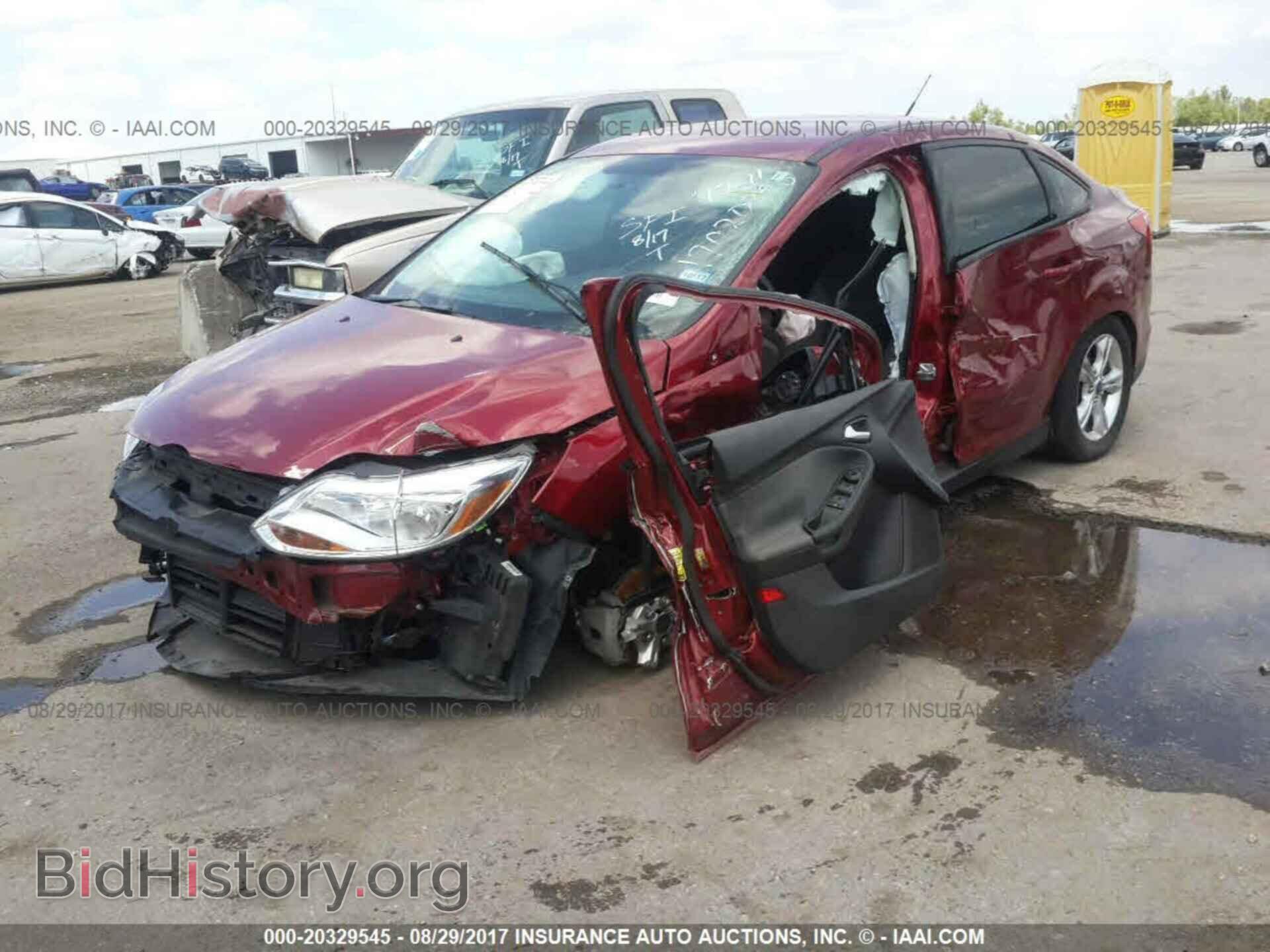 2014 Ford Focus - VIN: 1FADP3F23EL195594 - Фото 2