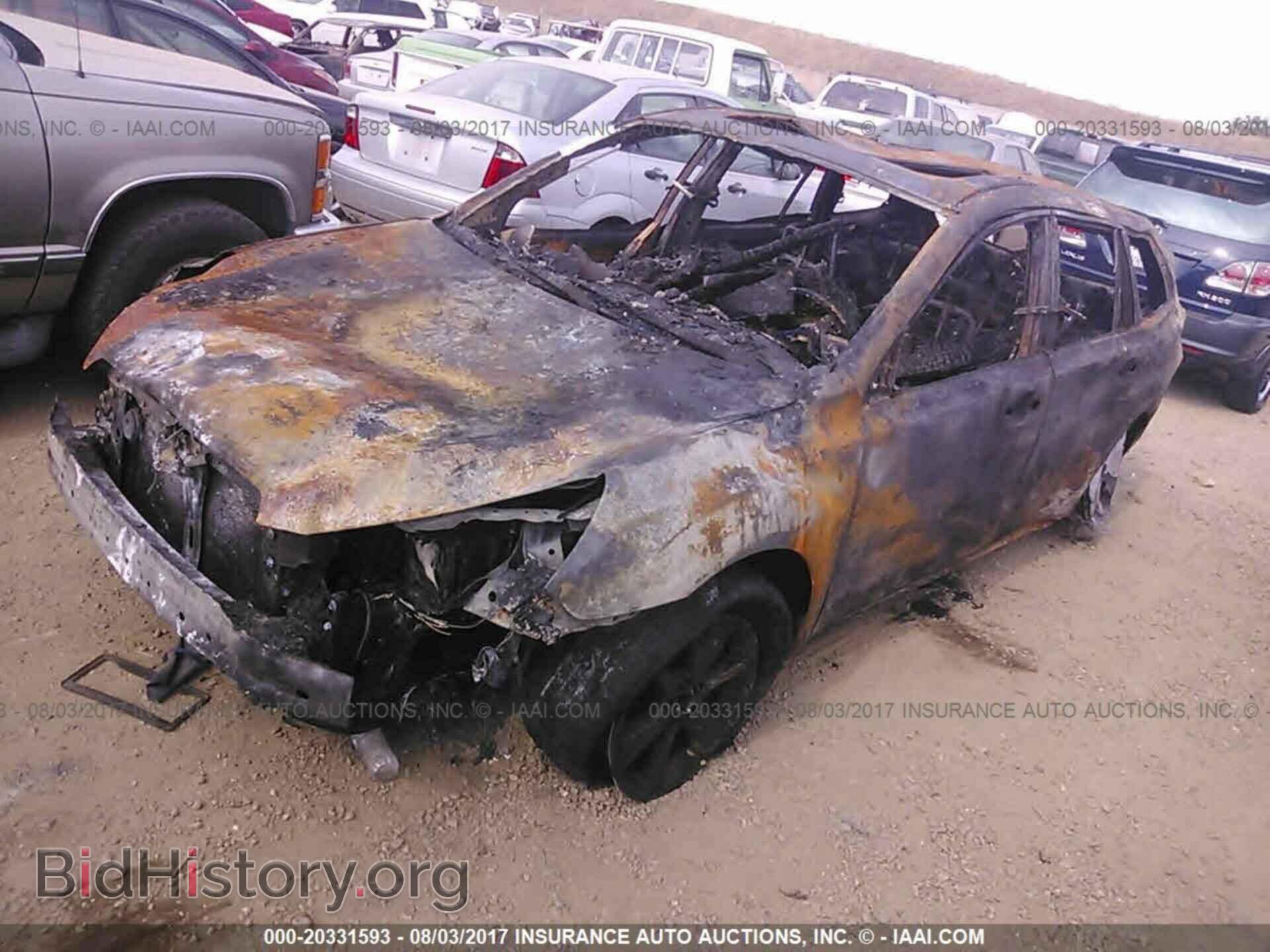 2013 Subaru Outback - VIN: 4S4BRDKC6D2201548 - Photo 2