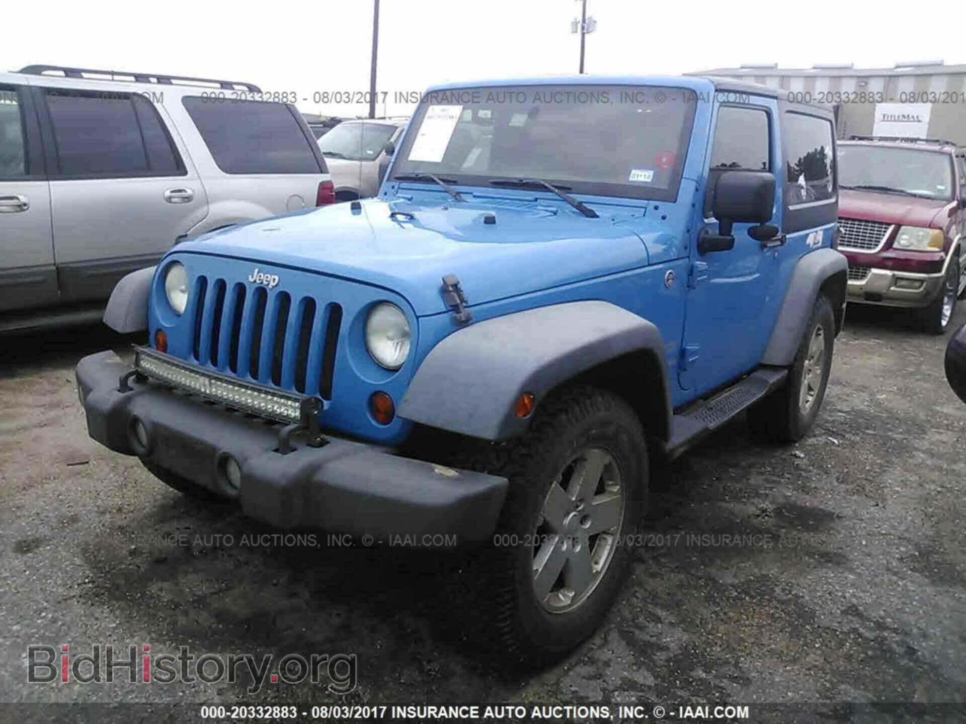 2011 Jeep Wrangler - VIN: 1J4AA2D11BL551551 - Фото 2