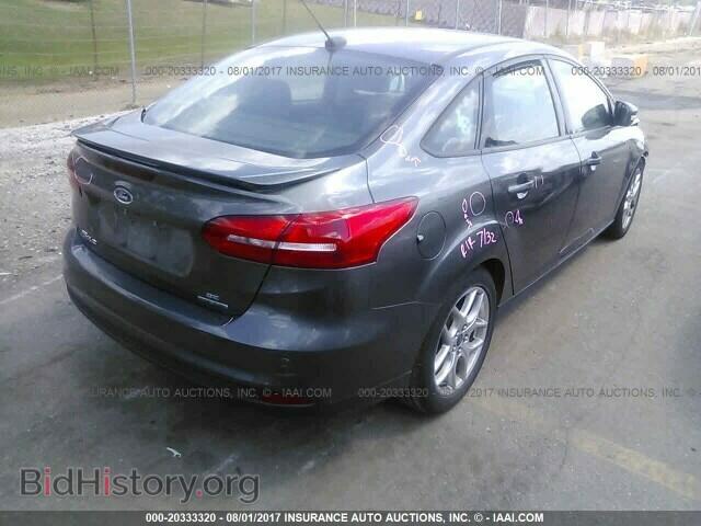 2015 Ford Focus - VIN: 1FADP3F2XFL254562 - Photo 4