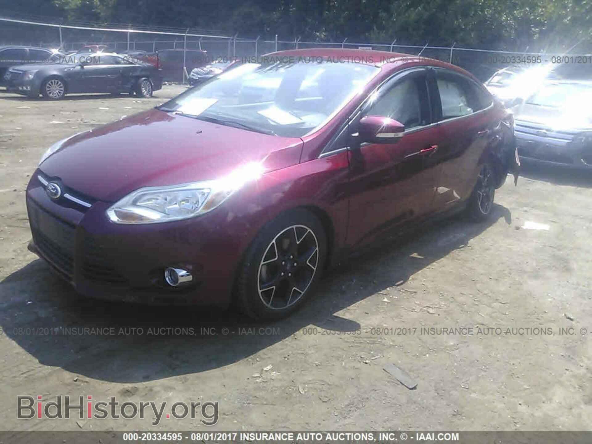 2014 Ford Focus - VIN: 1FADP3F27EL234199 - Фото 2