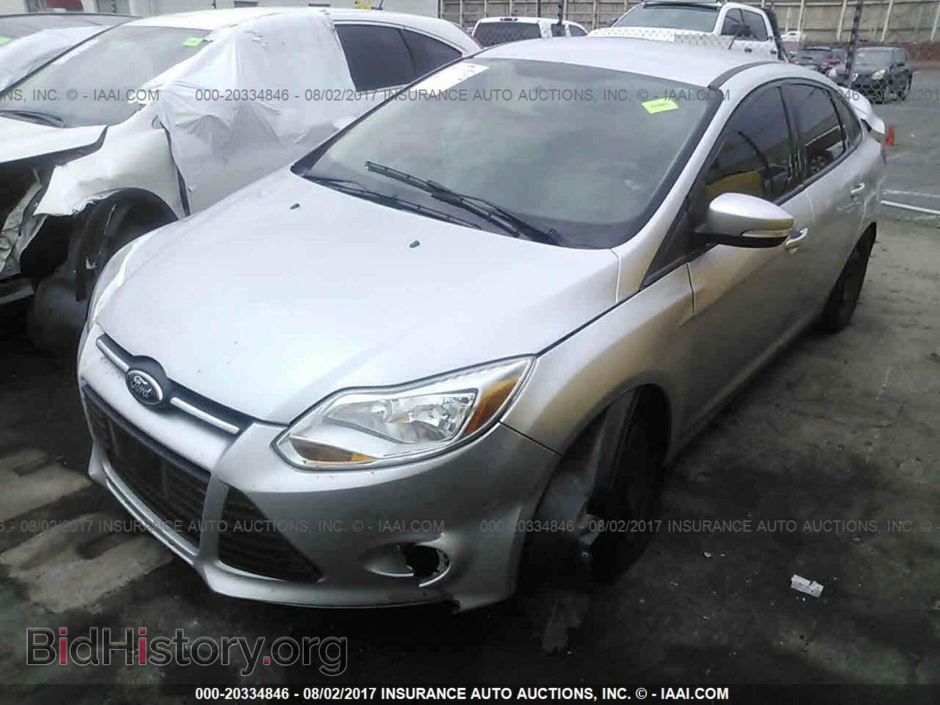 2014 Ford Focus - VIN: 1FADP3F28EL210249 - Фото 2