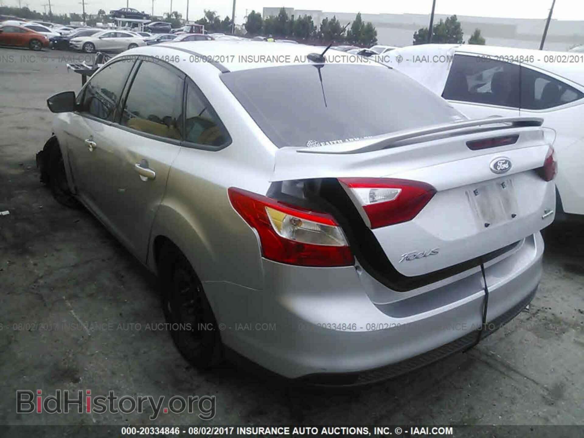 2014 Ford Focus - VIN: 1FADP3F28EL210249 - Фото 3