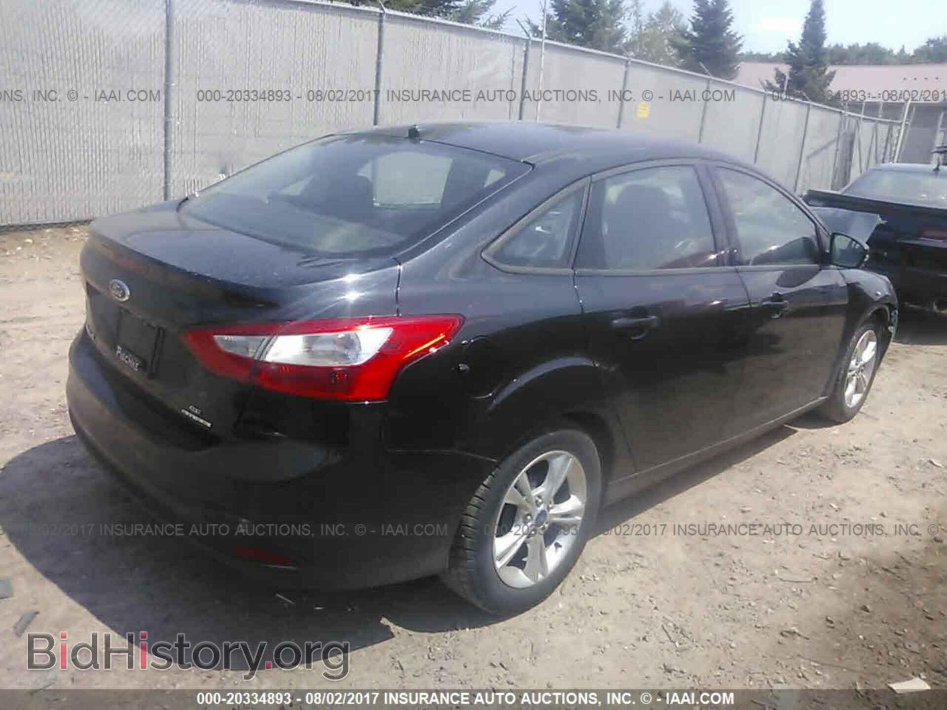 2014 Ford Focus - VIN: 1FADP3F25EL162032 - Photo 4