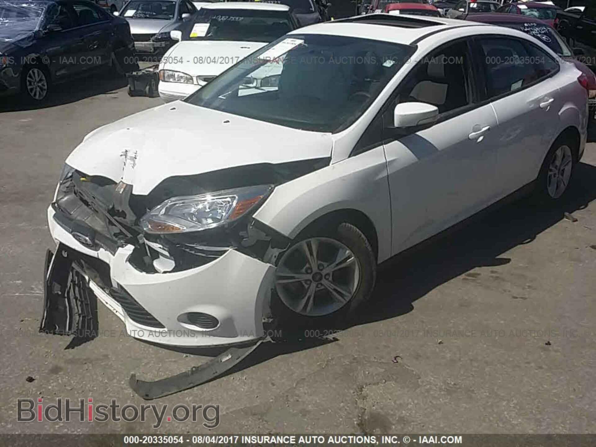 2014 Ford Focus - VIN: 1FADP3F2XEL317657 - Фото 2