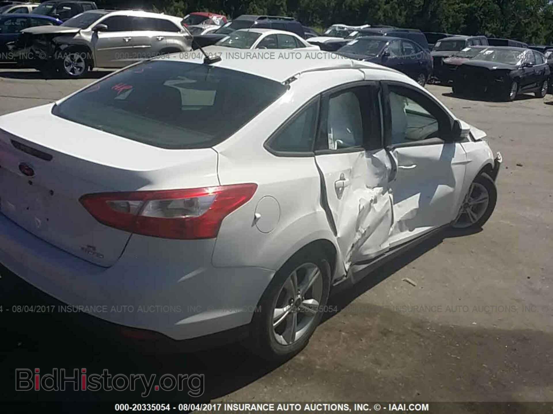 2014 Ford Focus - VIN: 1FADP3F2XEL317657 - Фото 4
