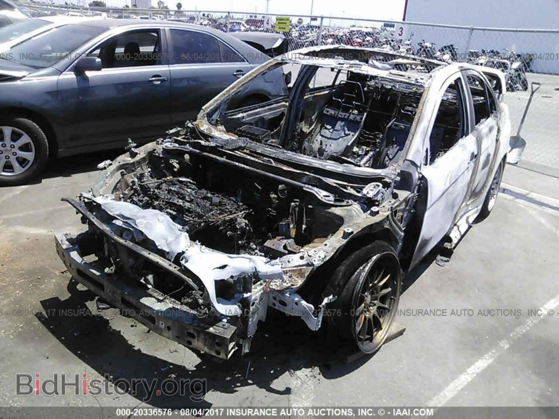 2014 Mitsubishi Lancer - VIN: JA32W8FV2EU024582 - Фото 2