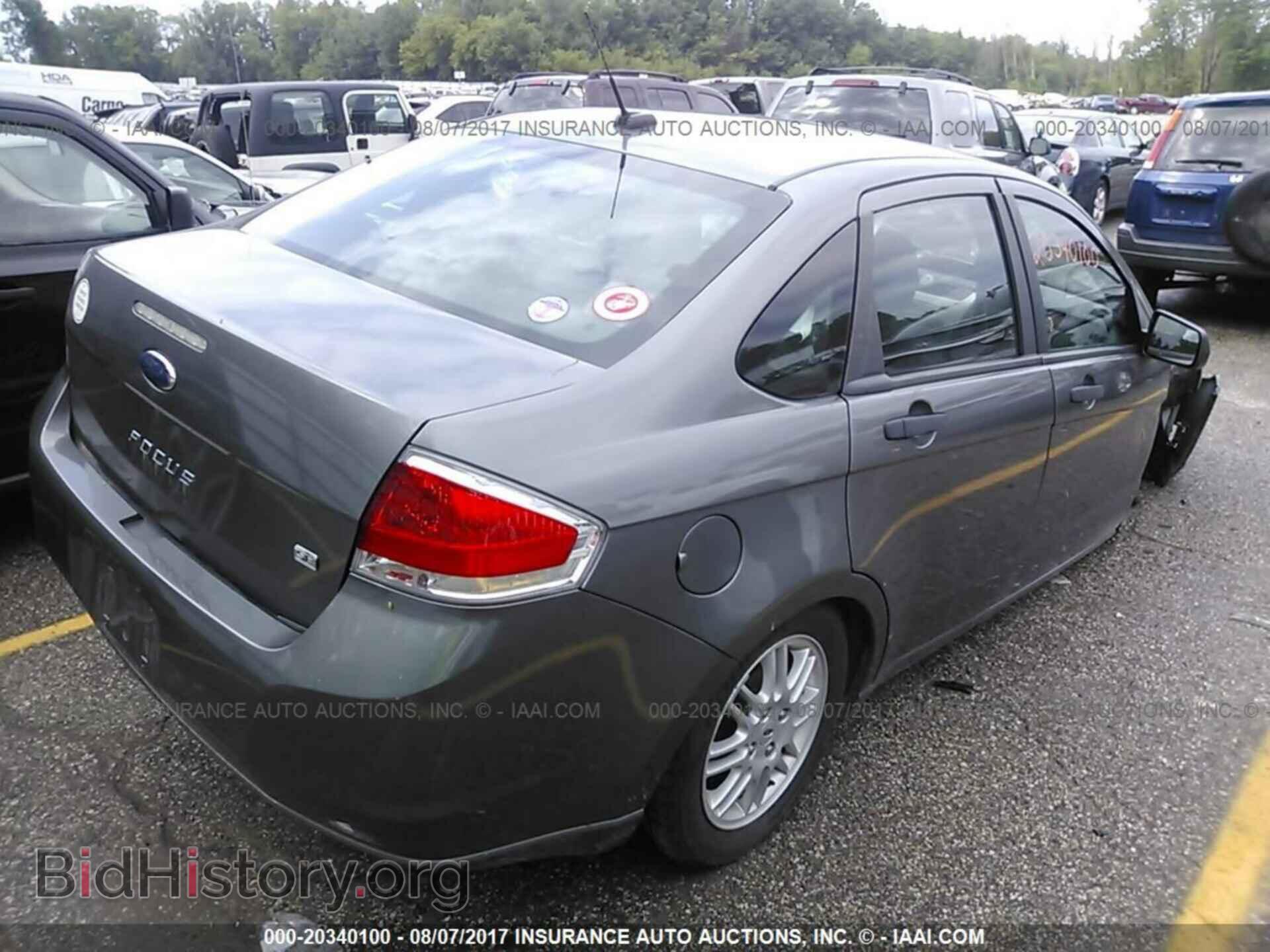 2011 Ford Focus - VIN: 1FAHP3FN0BW175986 - Photo 4